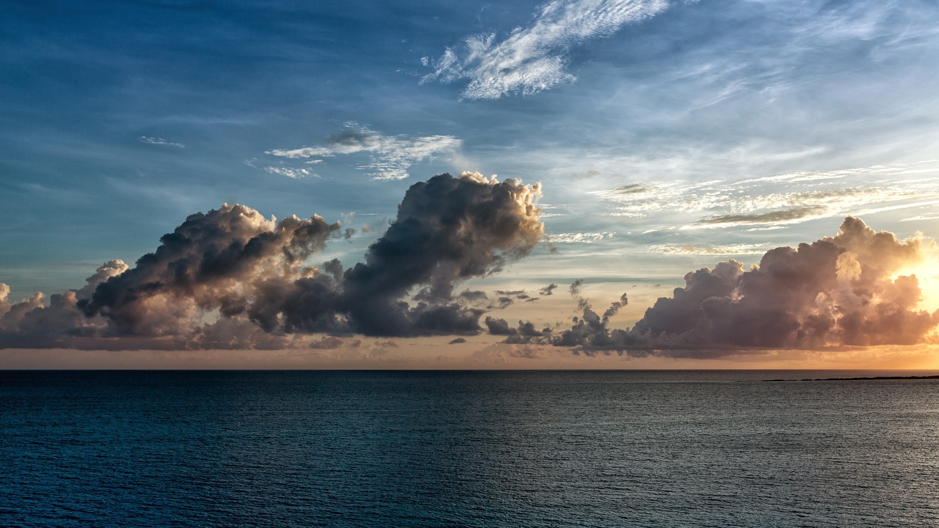 Clouds over the sea at sunset HD Wallpaper