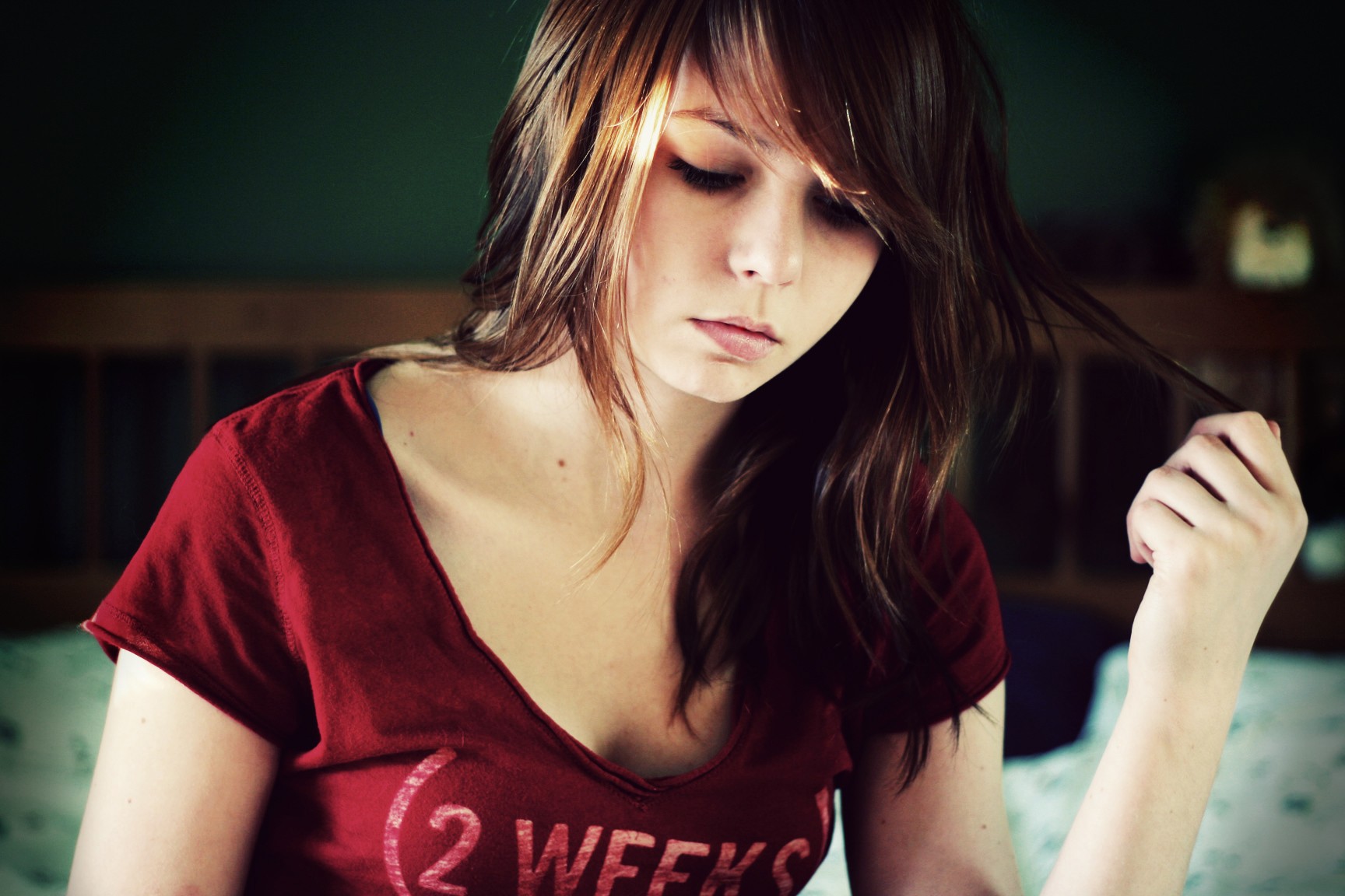 Young woman with brown hair wearing a red t-shirt HD Wallpaper