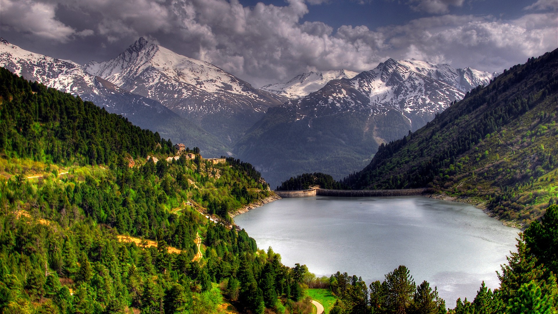Aussois dam and lake with snow-capped mountains HD Wallpaper