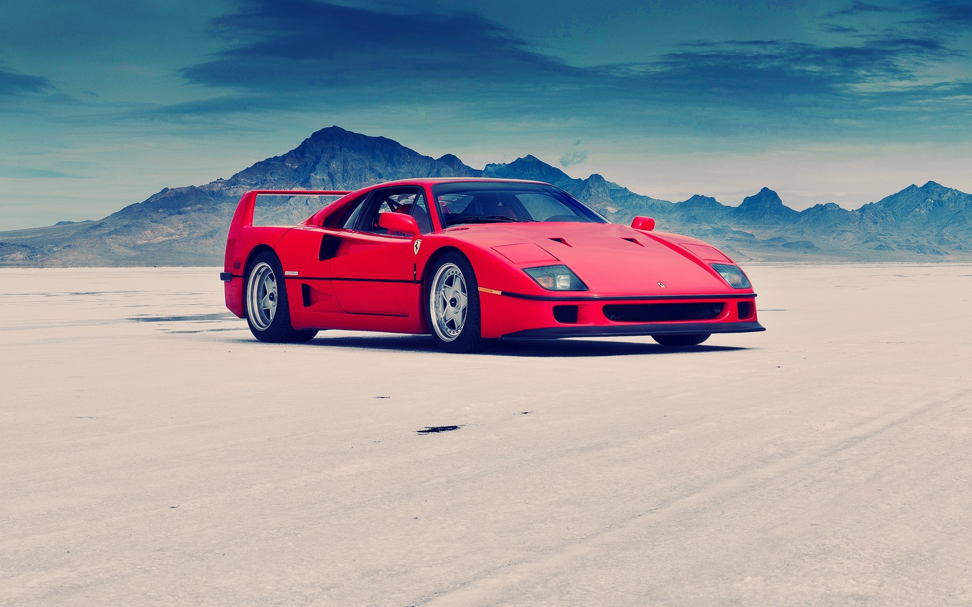 Red Ferrari F40 on a Salt Flat with Mountains HD Wallpaper