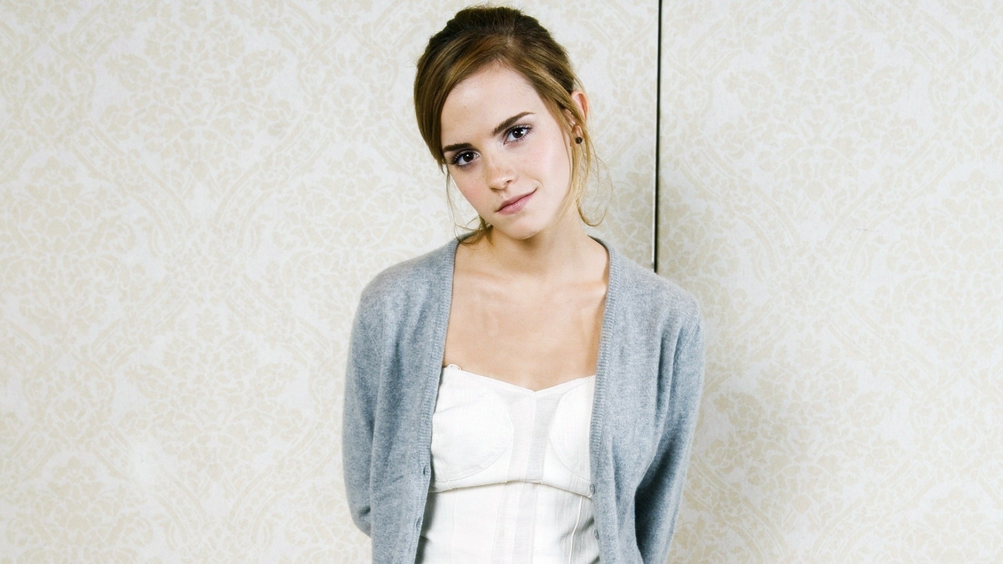 Emma Watson wearing a grey cardigan and white top HD Wallpaper