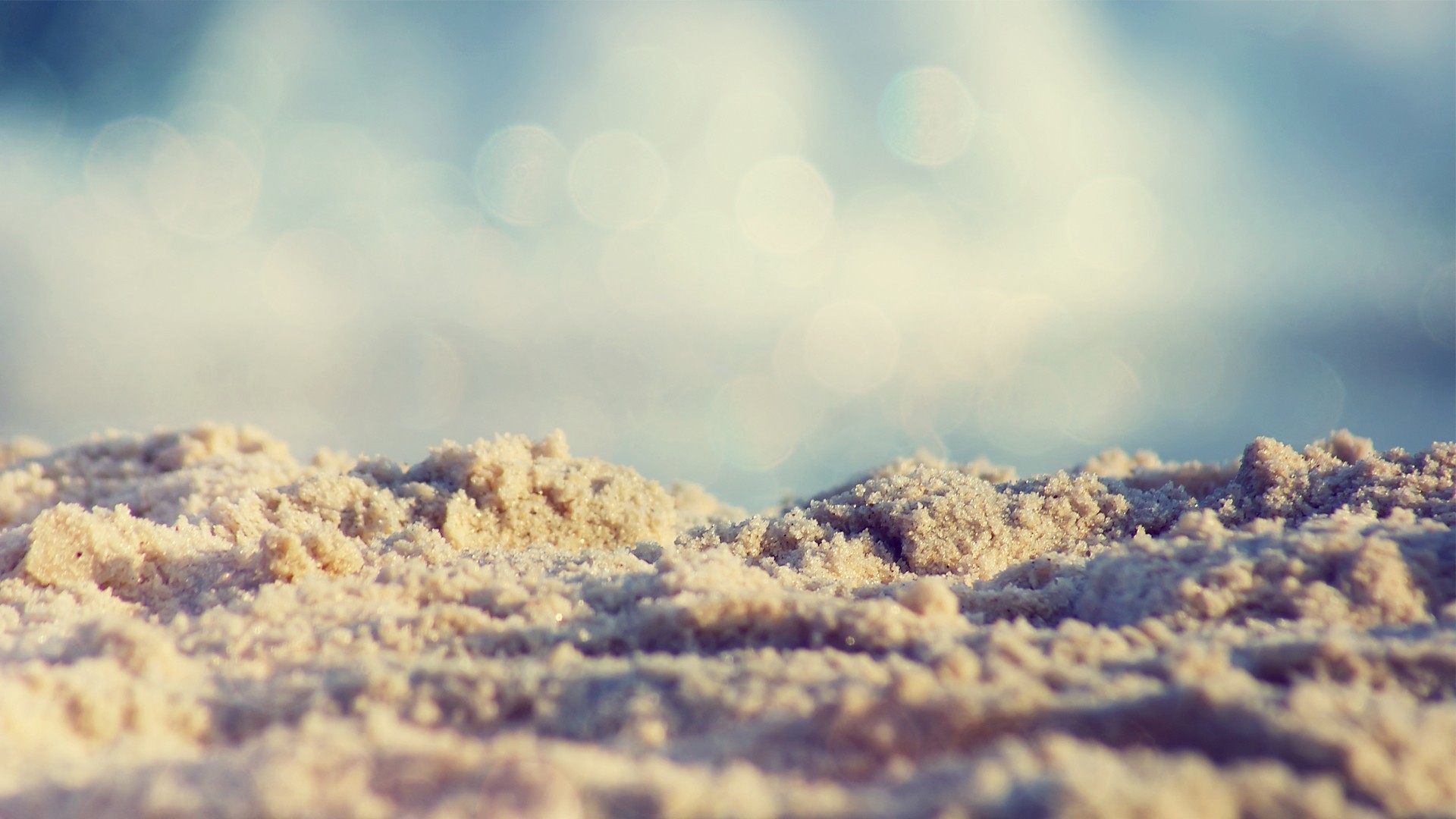 Close-up of sand with bokeh background HD Wallpaper