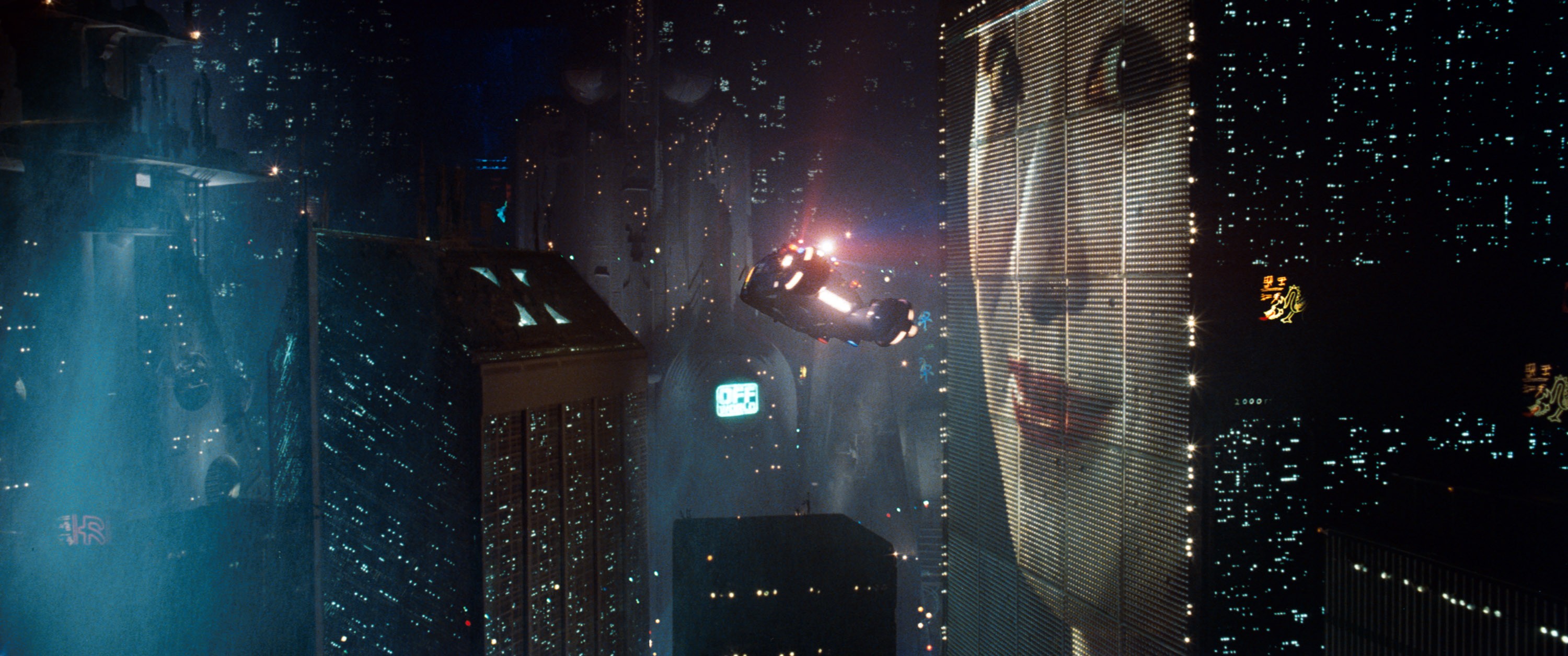 Blade Runner city with flying vehicle and giant face advertisement HD Wallpaper