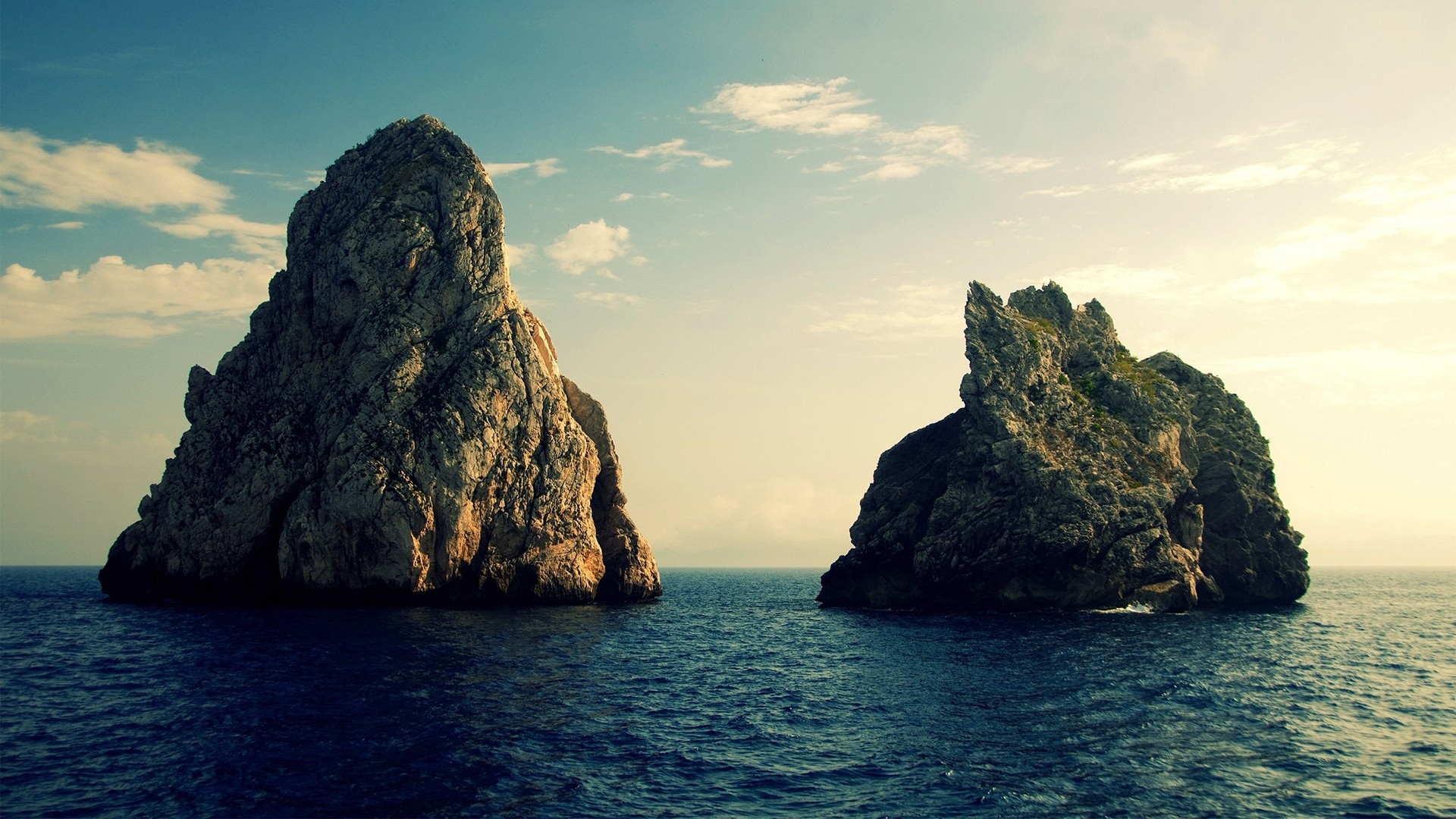 Two rocky islands in the sea near Spain HD Wallpaper