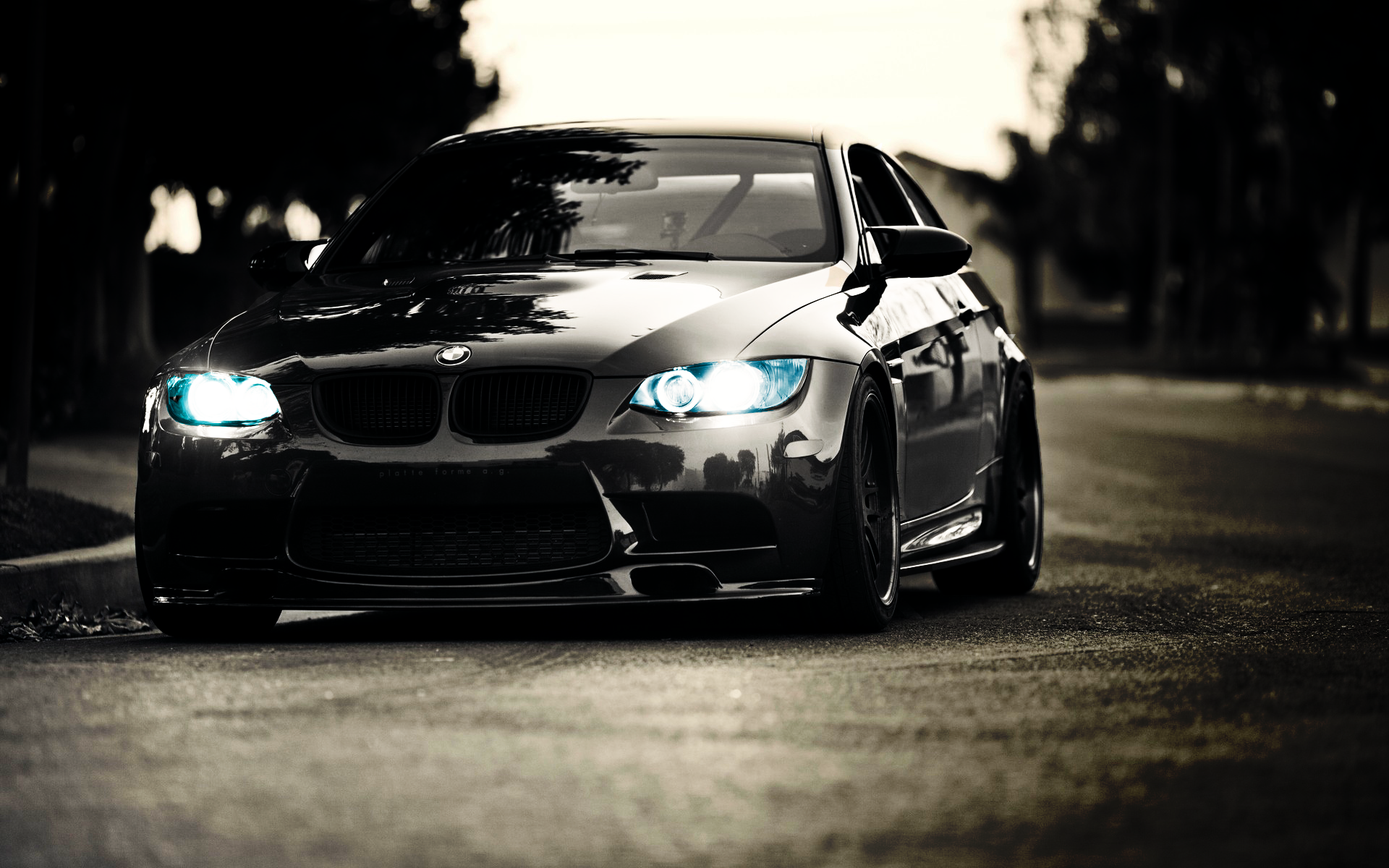 Black BMW M3 parked on a street HD Wallpaper