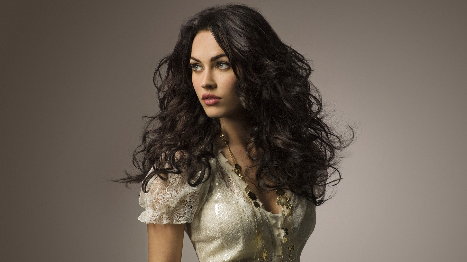 Megan Fox posing in a sparkly top HD Wallpaper