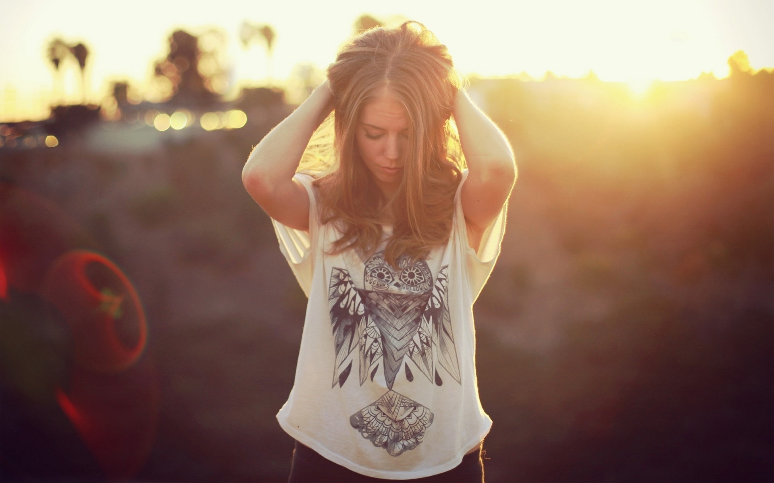 Woman with hands on head during sunset HD Wallpaper