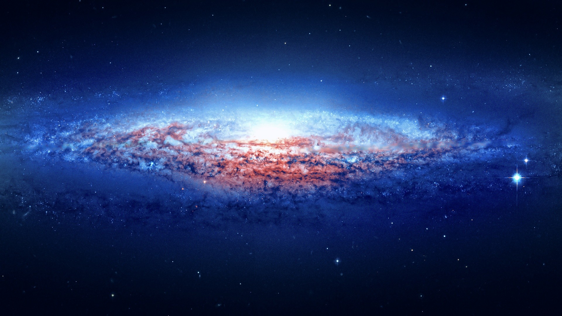 A spiral galaxy in deep space HD Wallpaper