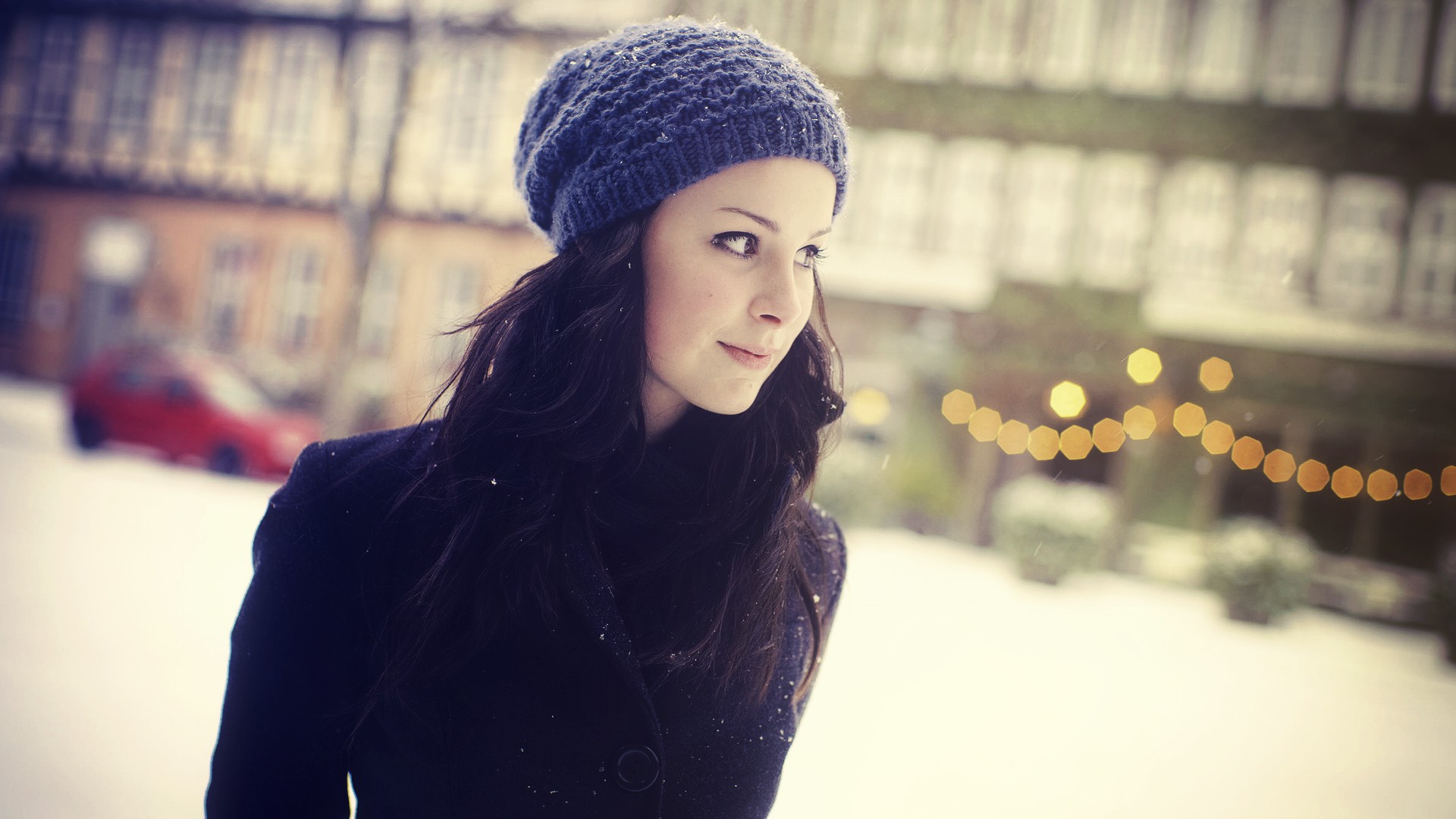 Lena Meyer-Landrut wearing a blue knit hat and black coat HD Wallpaper