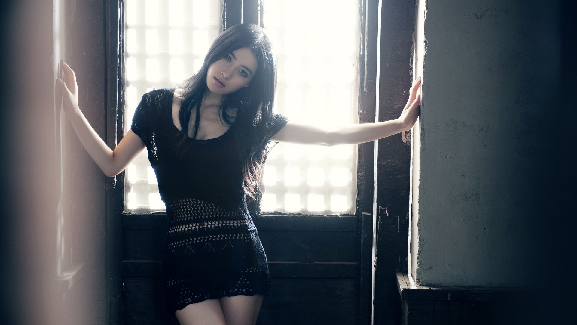 Asian woman with dark hair in a black dress HD Wallpaper