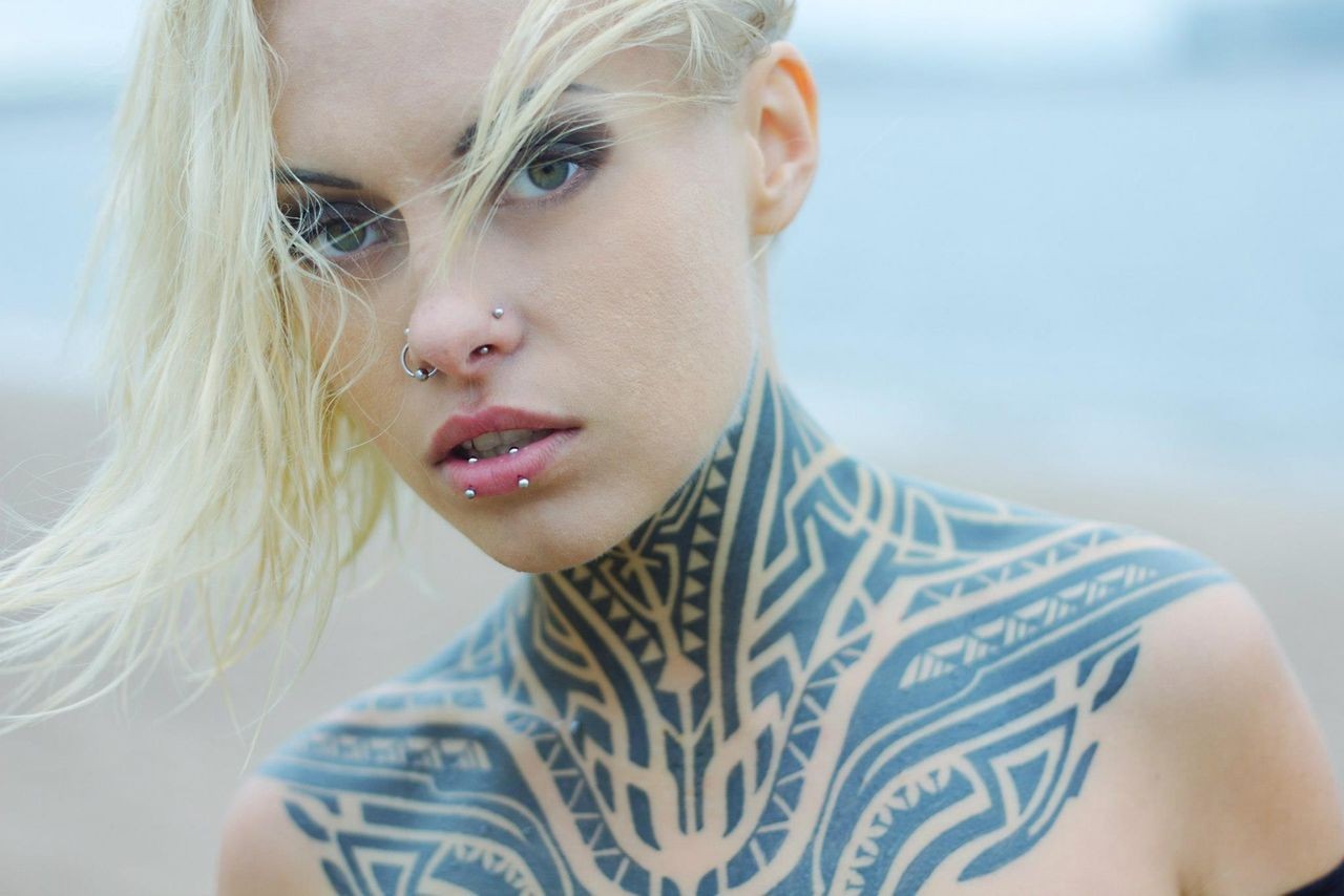 Teya Salat with extensive neck and chest tattoos HD Wallpaper