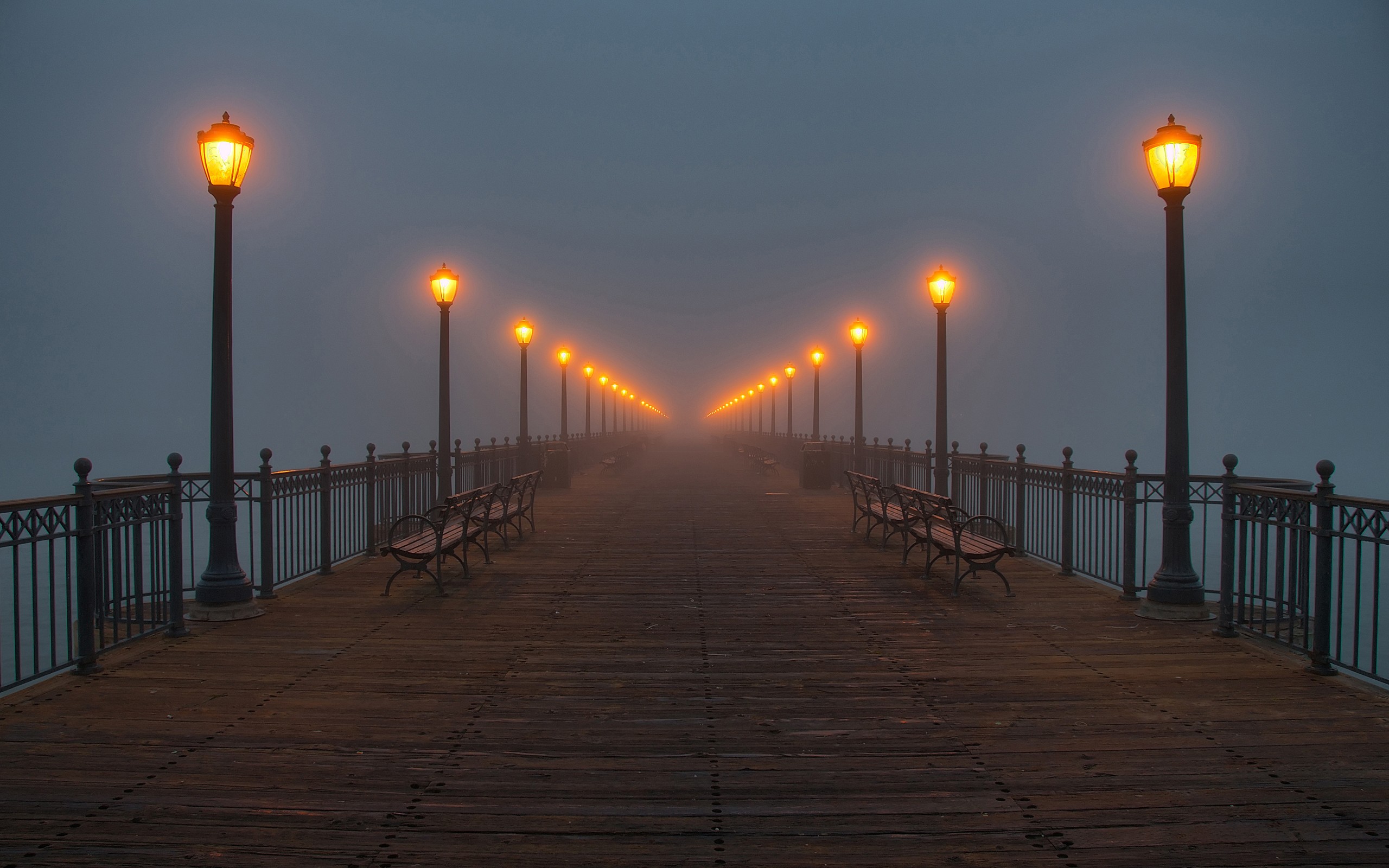 Pier with street lights in the mist HD Wallpaper