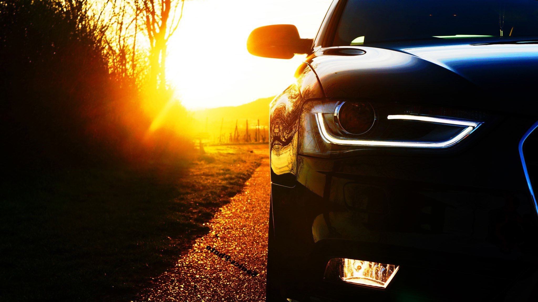 Audi car on a road during sunset HD Wallpaper
