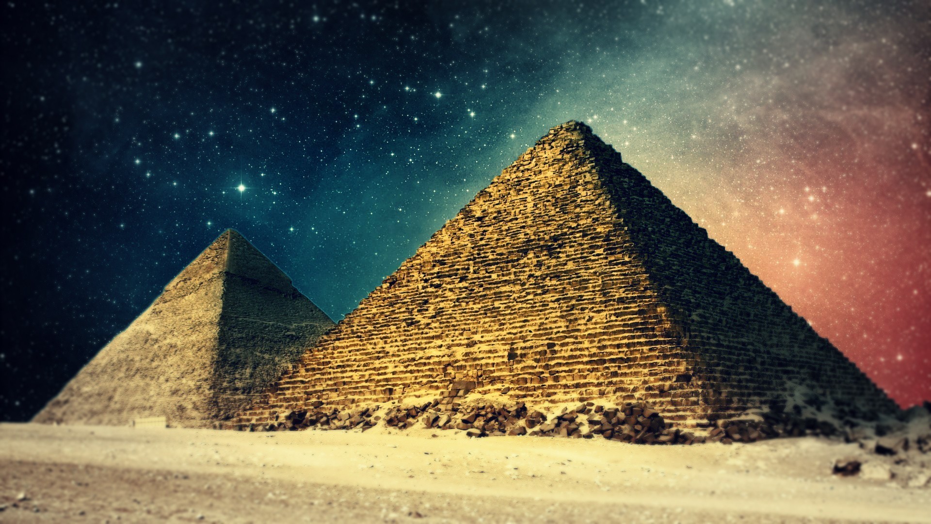 Pyramids under a starry sky HD Wallpaper