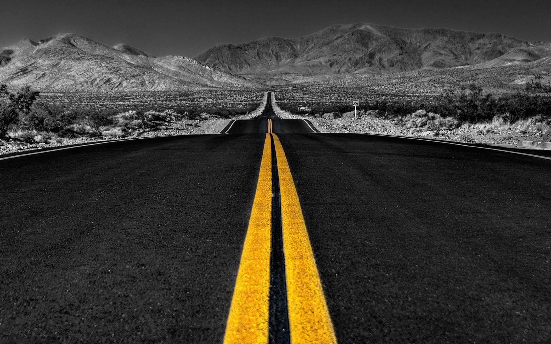 Desert road with mountains and selective coloring HD Wallpaper