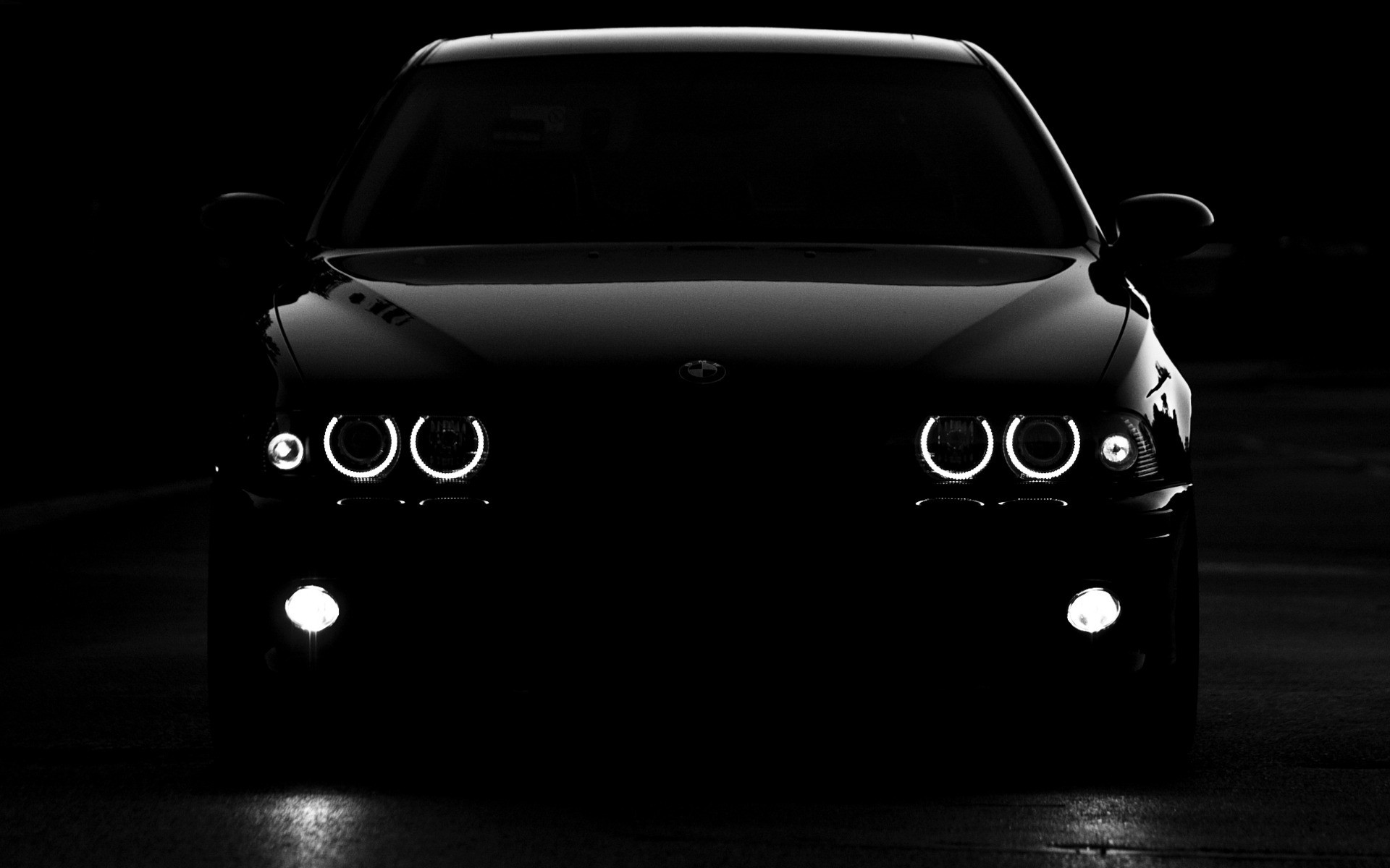Black BMW 5 Series car with illuminated headlights HD Wallpaper