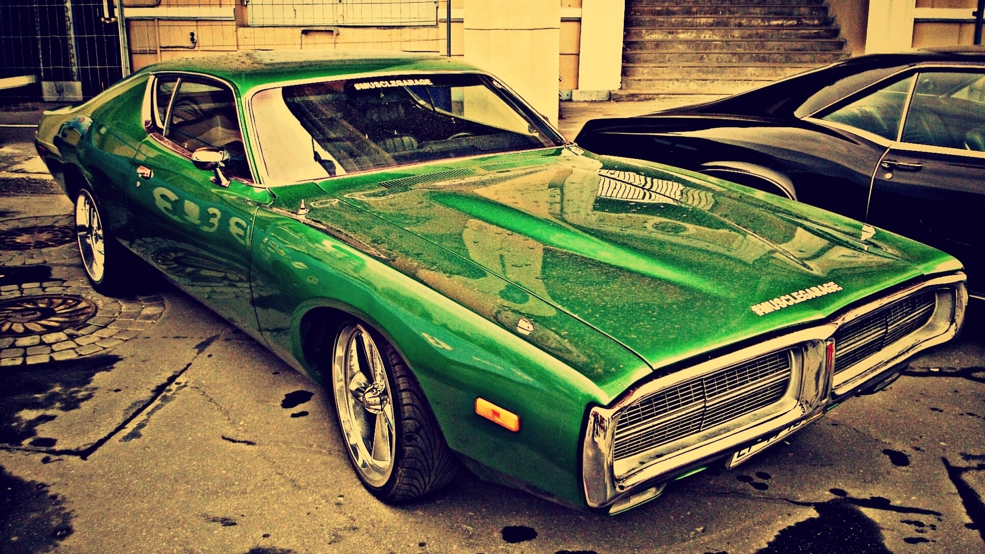 Green vintage Dodge Charger parked on a street HD Wallpaper