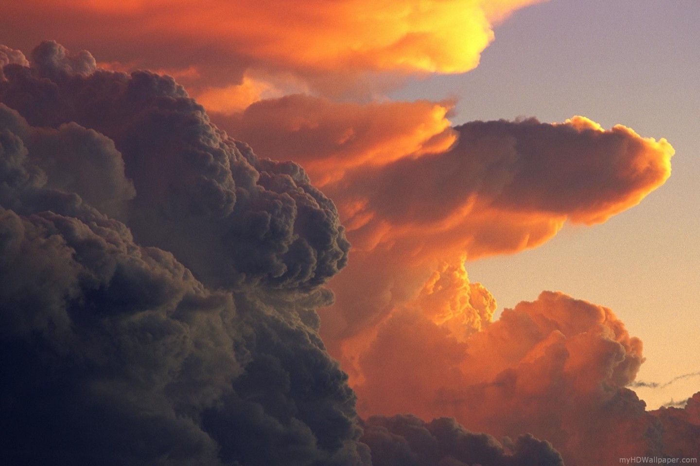 Dramatic sunset clouds with orange and dark tones HD Wallpaper