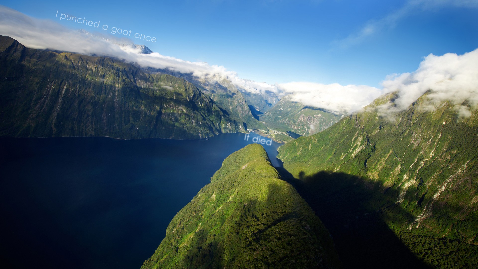 Mountains and a lake with text overlay HD Wallpaper