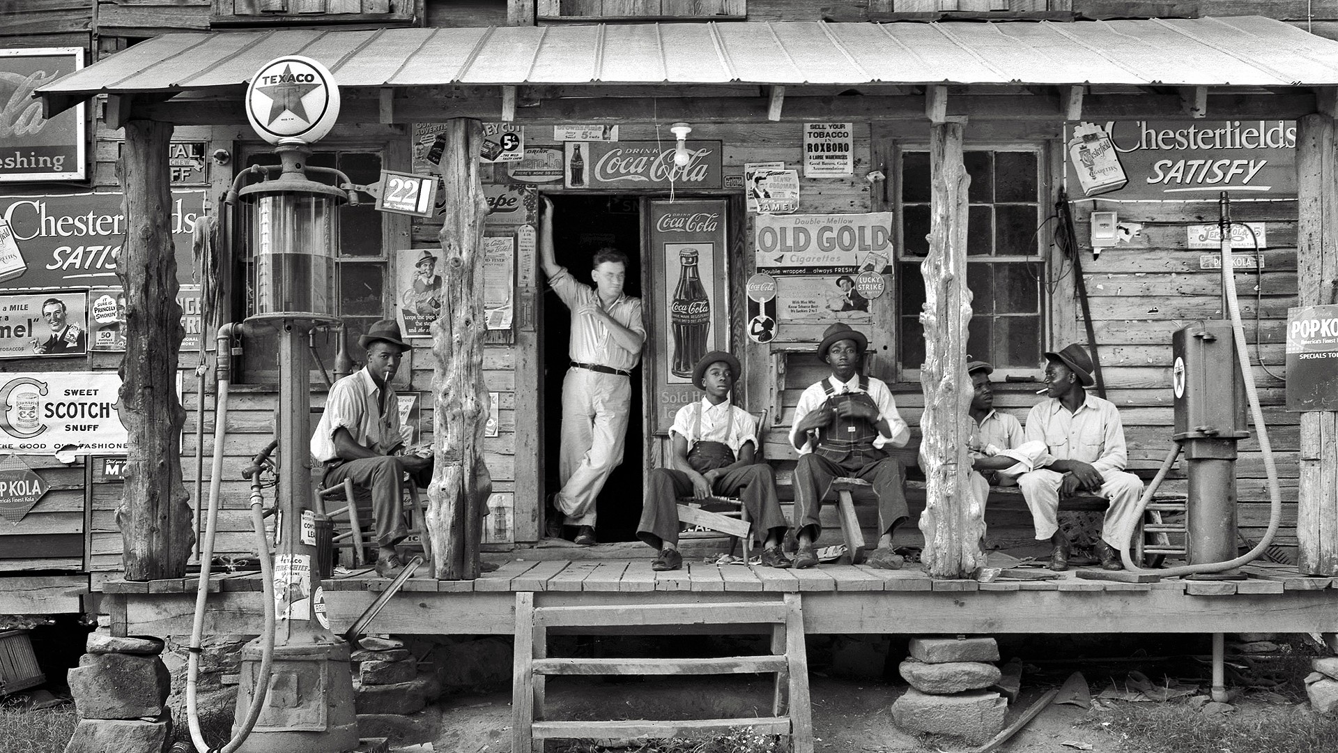Vintage Coca-Cola store with men on the porch HD Wallpaper