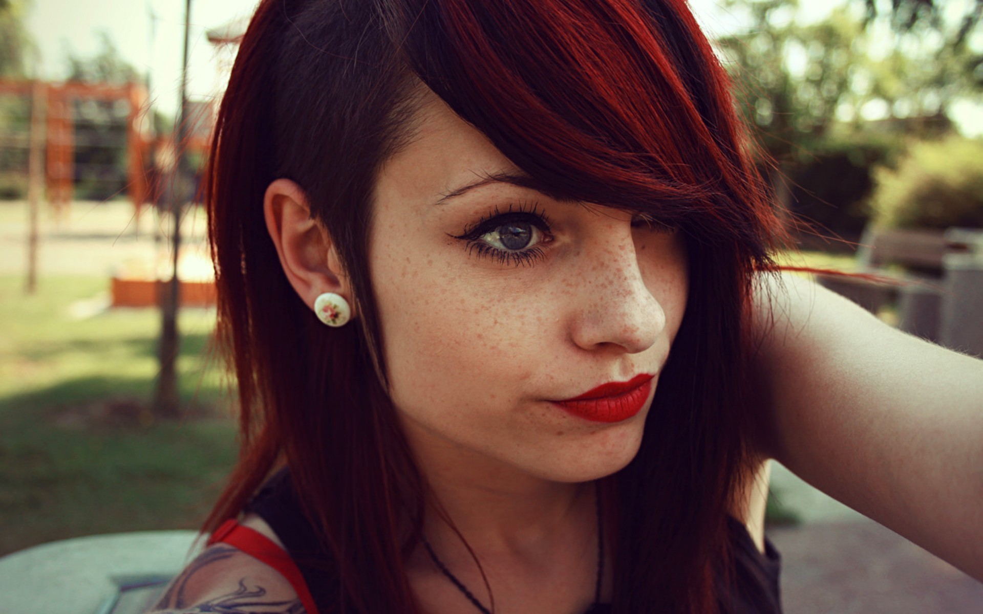 Young woman with red hair and freckles HD Wallpaper