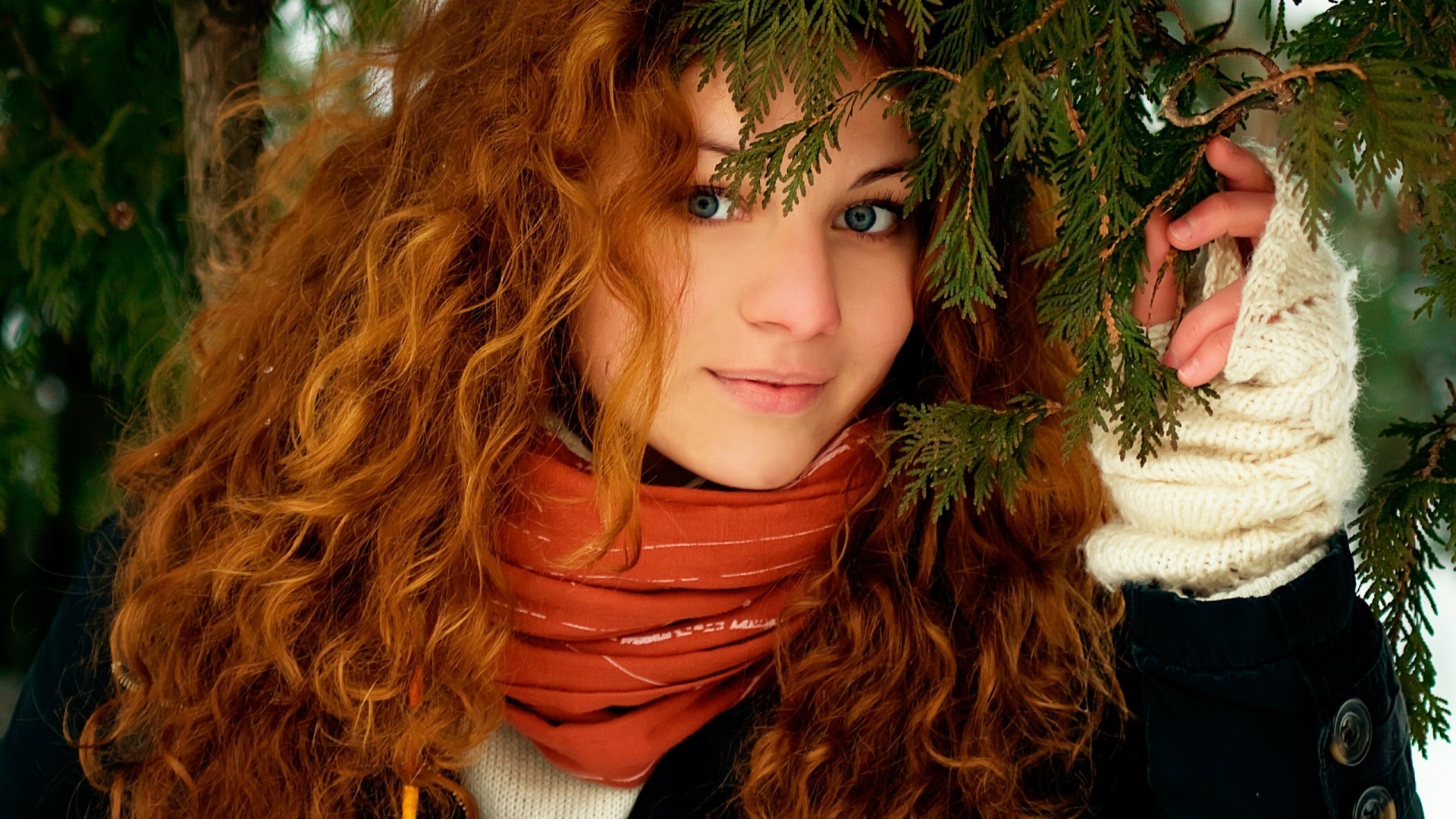 Redhead woman with blue eyes in winter forest HD Wallpaper
