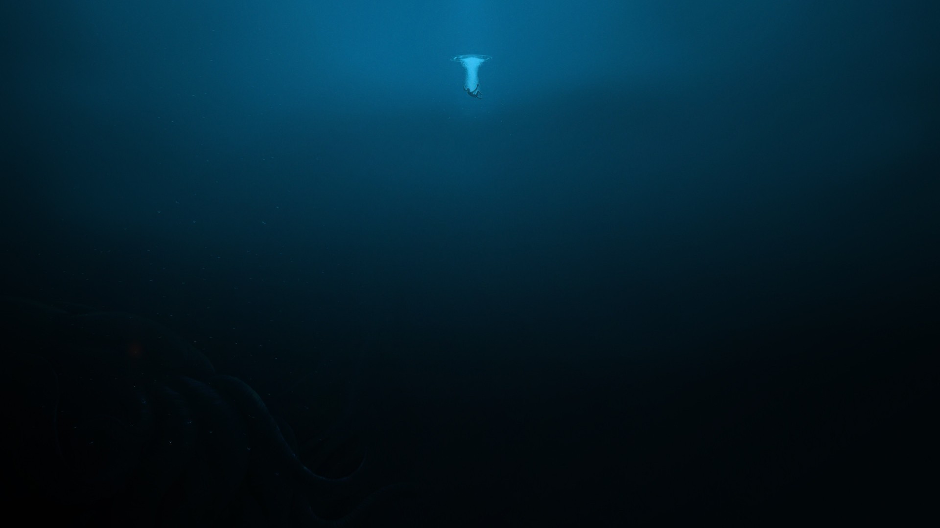 Deep sea creature and diver in dark blue water HD Wallpaper