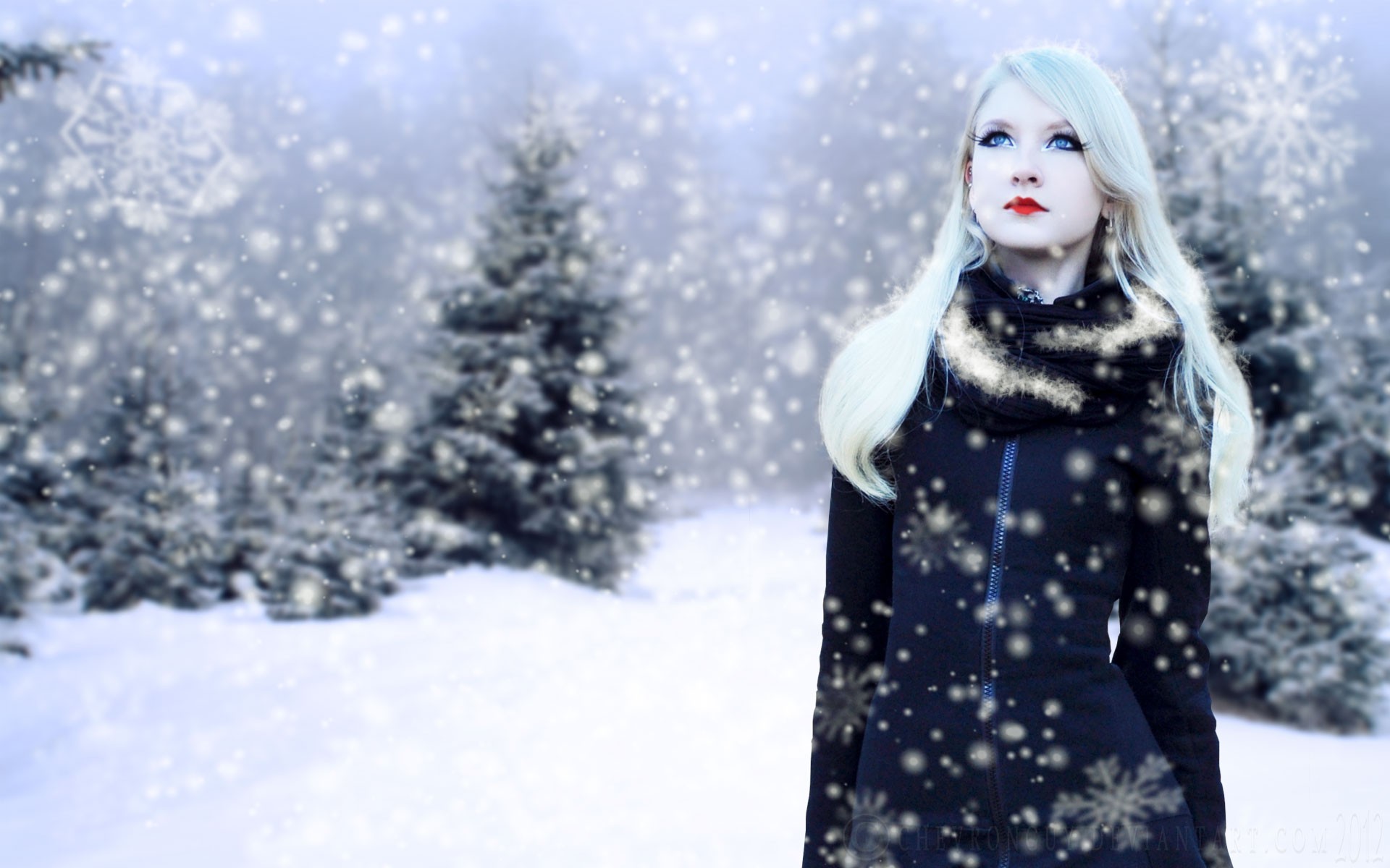 Blonde woman in a snowy forest HD Wallpaper