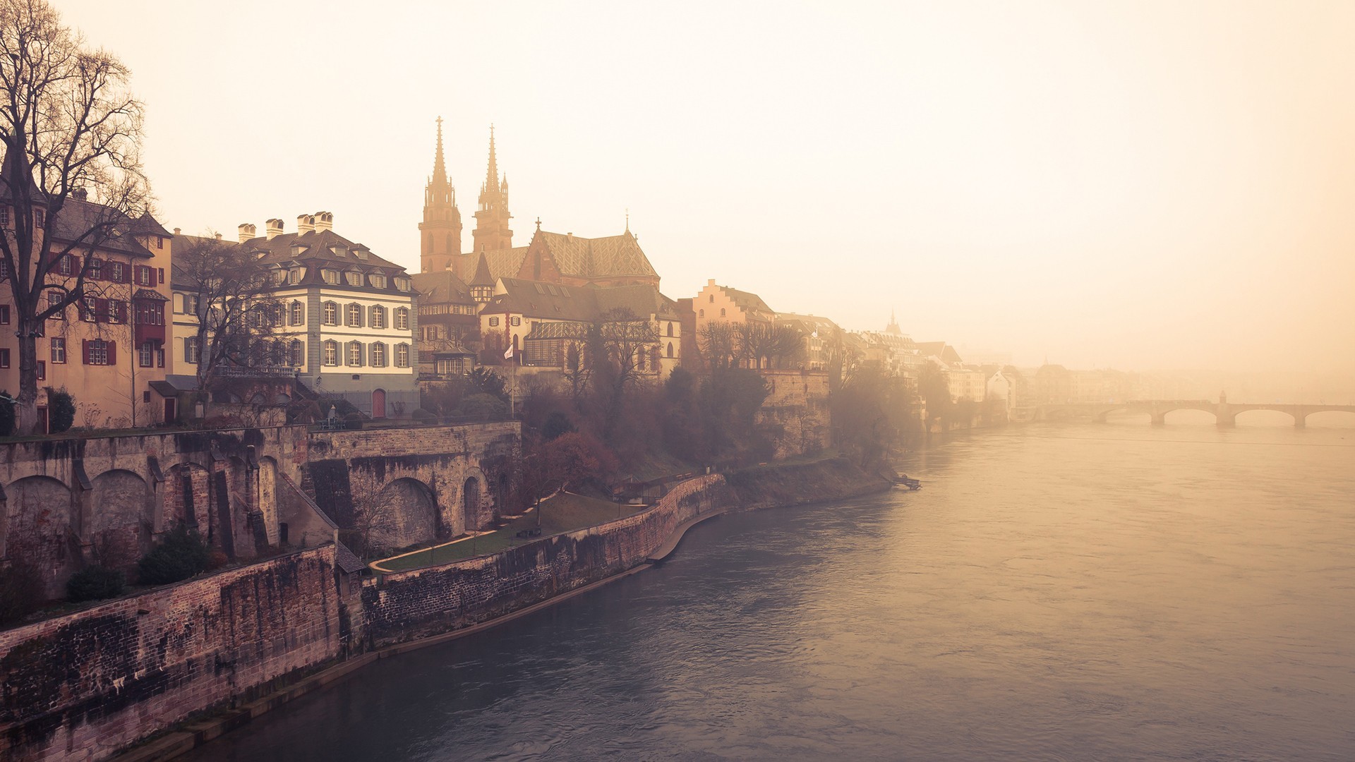 Basel cityscape with river and bridge in mist HD Wallpaper