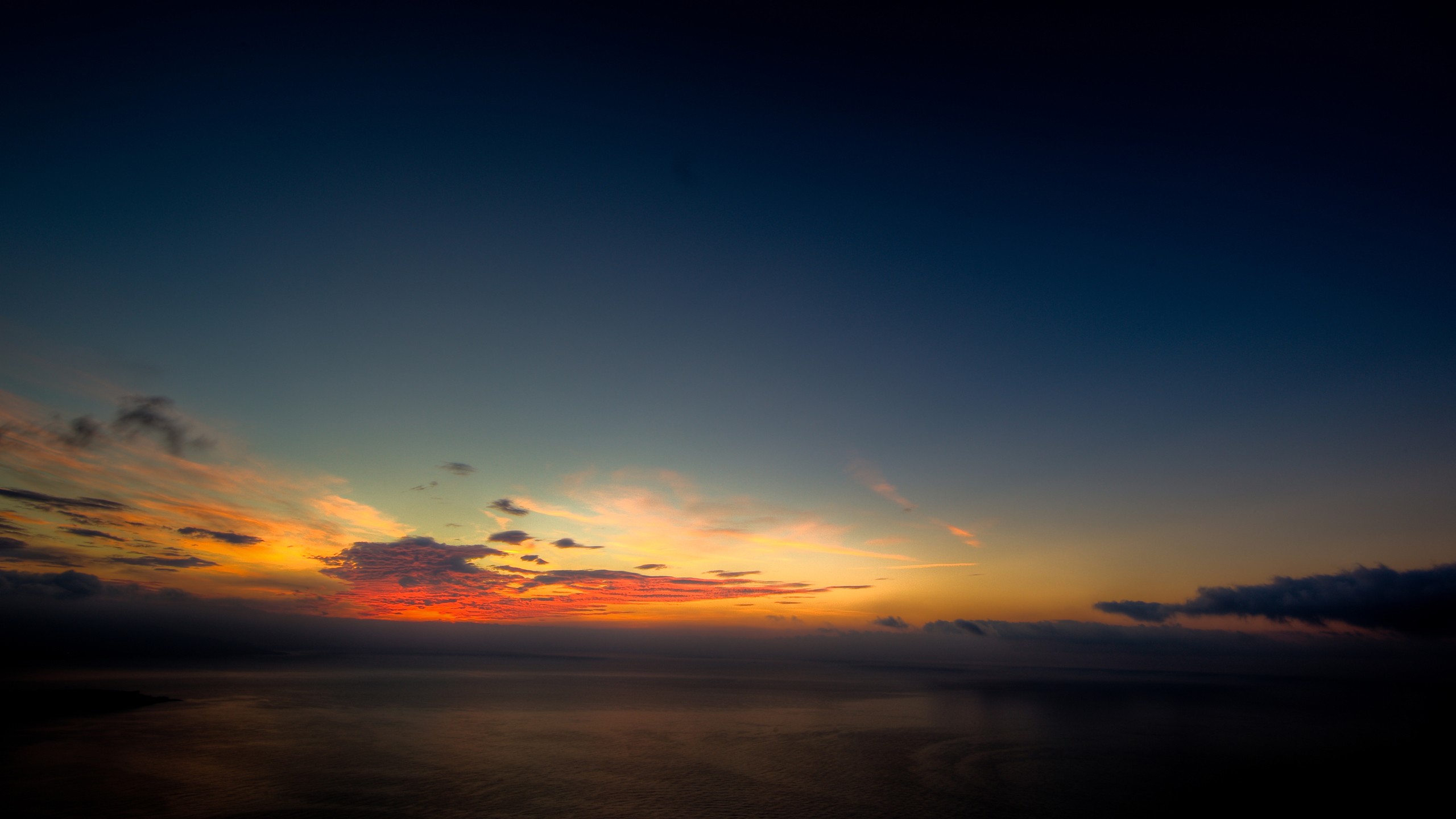 Sunset over the ocean with colorful clouds HD Wallpaper