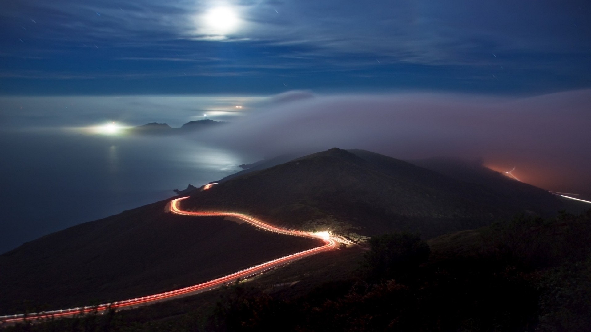 Night road on coast with moon and clouds HD Wallpaper