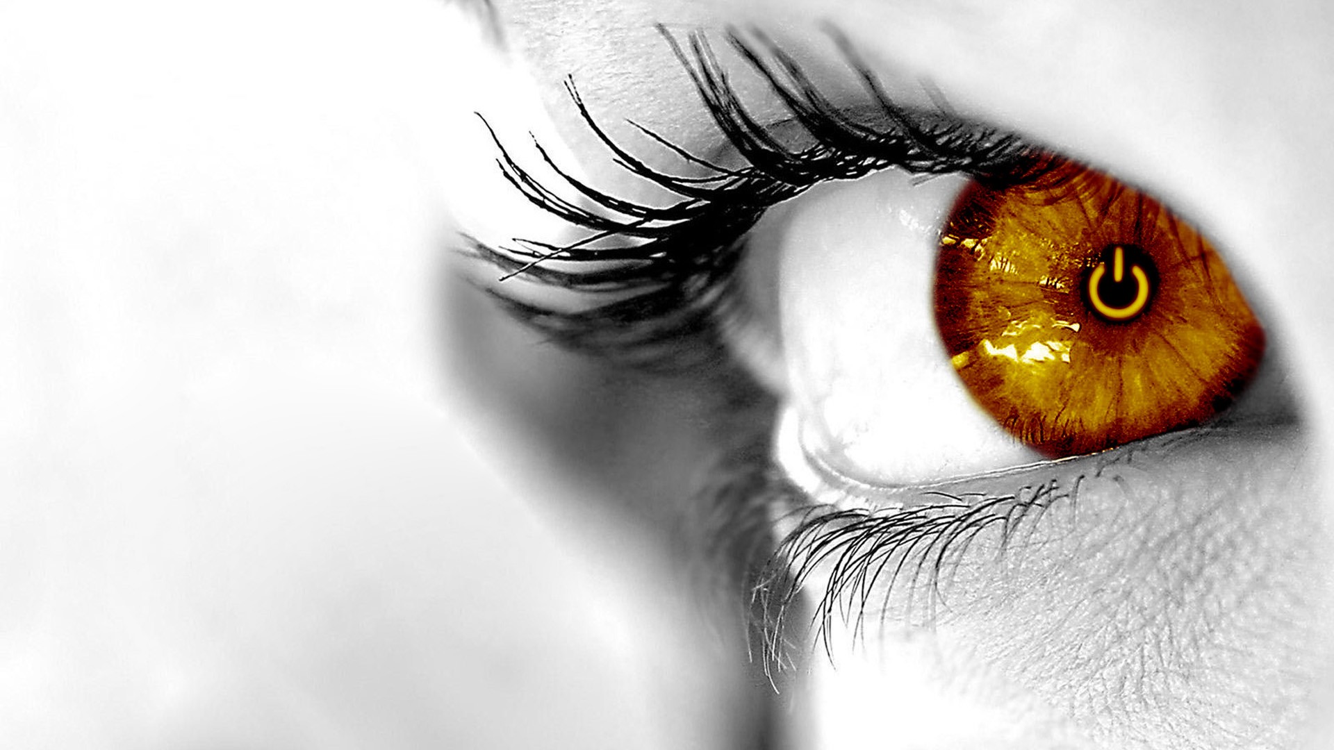 Close-up of a woman's eye with a power symbol HD Wallpaper
