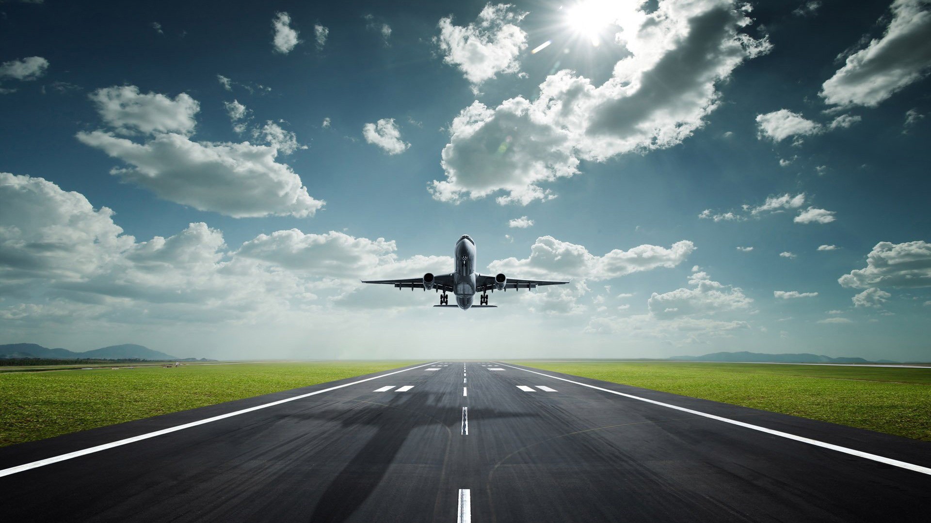 Airplane taking off from runway under the sun HD Wallpaper