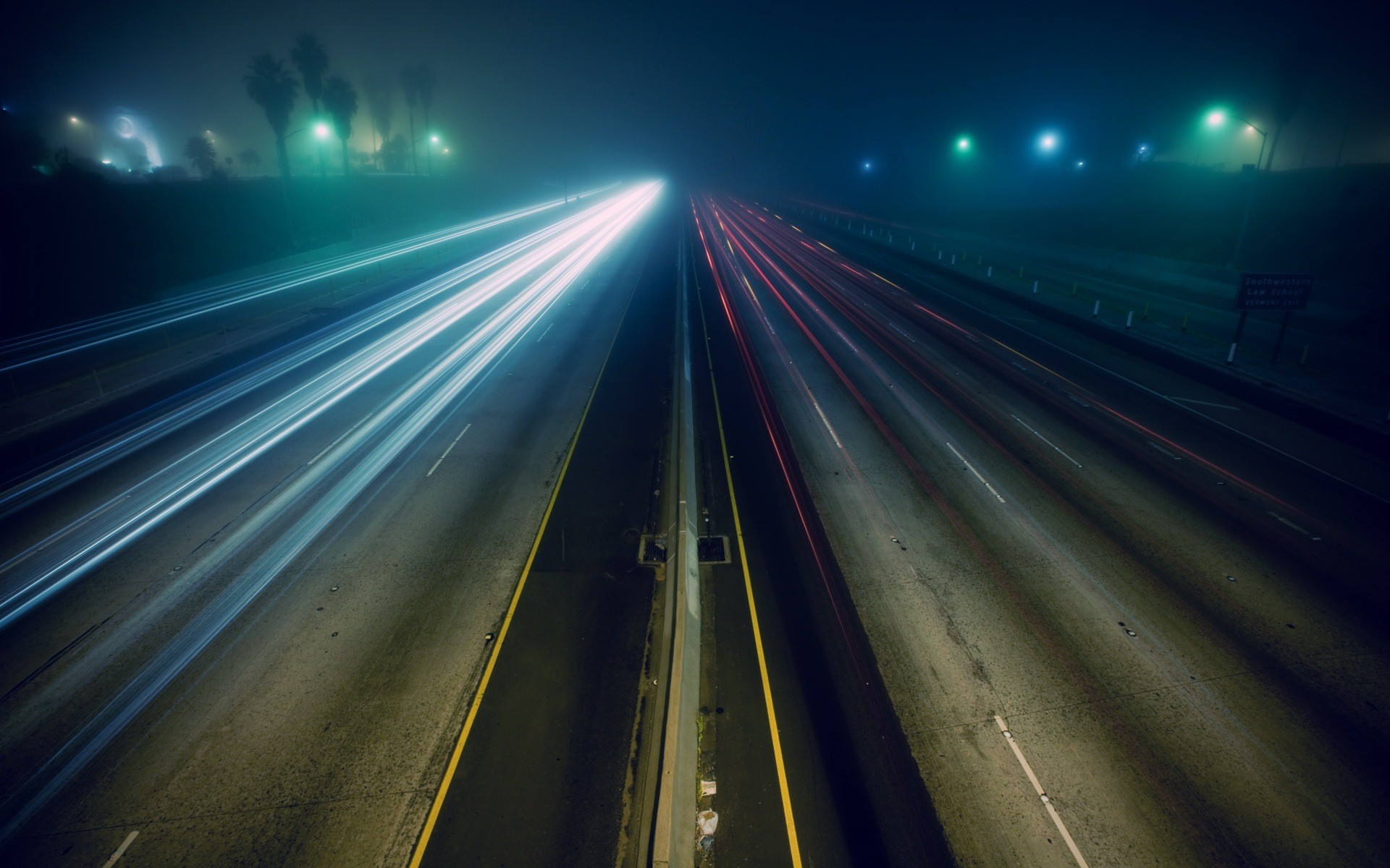 Long exposure of a highway at night with light trails HD Wallpaper