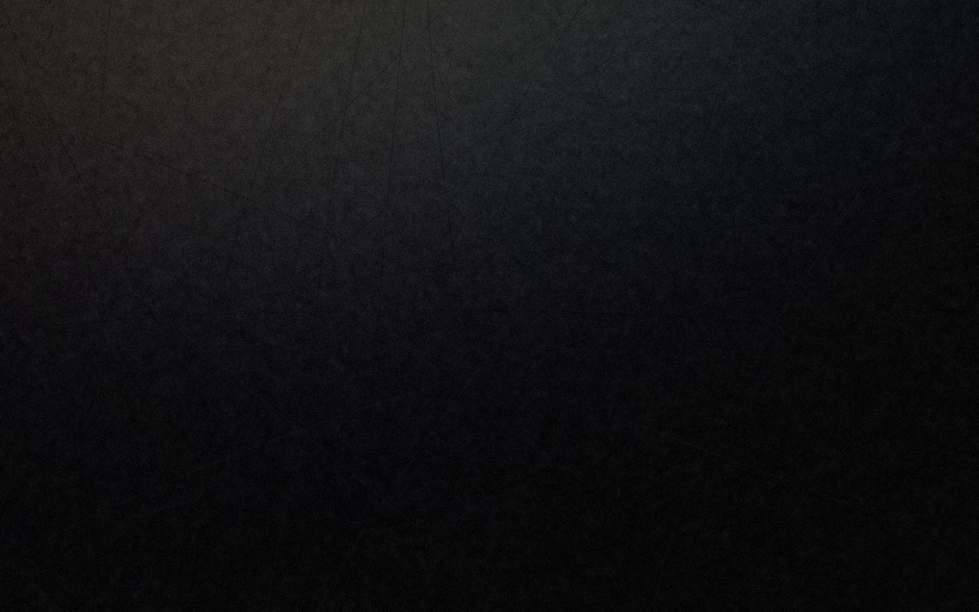 Dark textured surface with subtle scratches HD Wallpaper