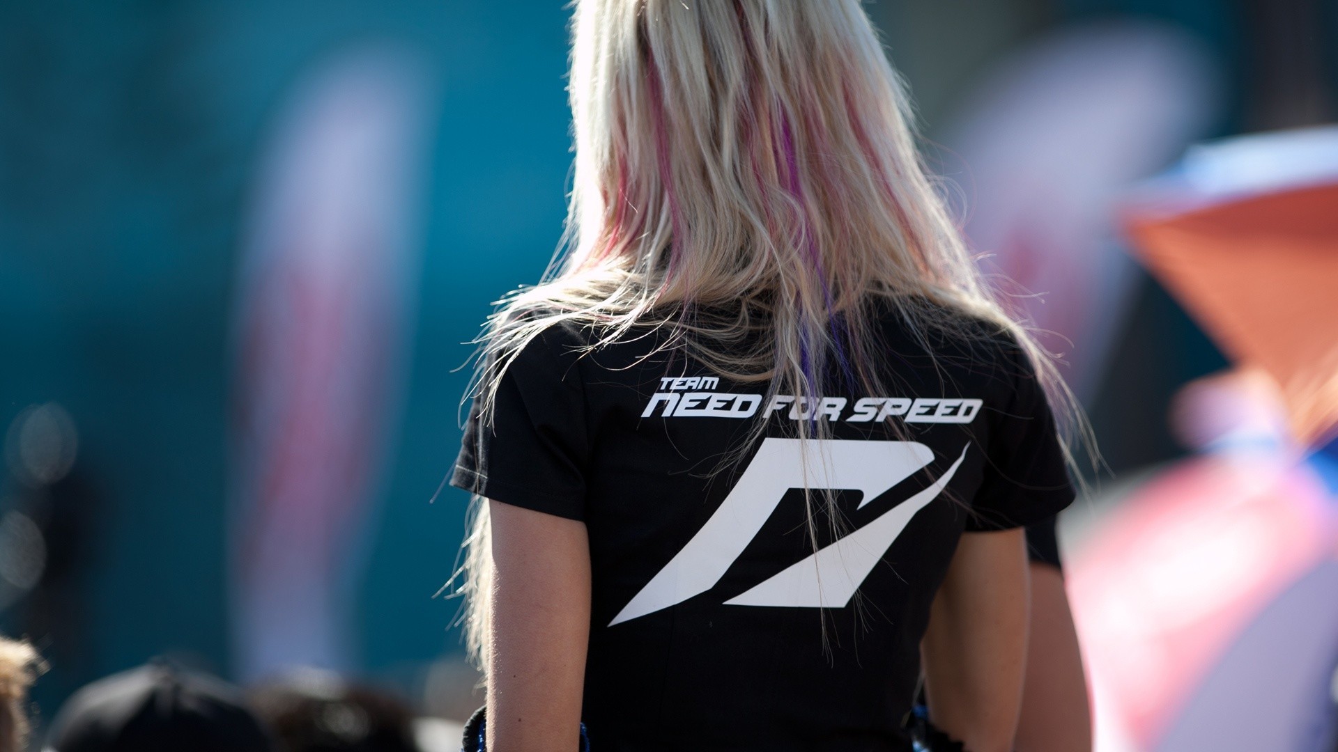 Woman wearing a black Need for Speed t-shirt HD Wallpaper