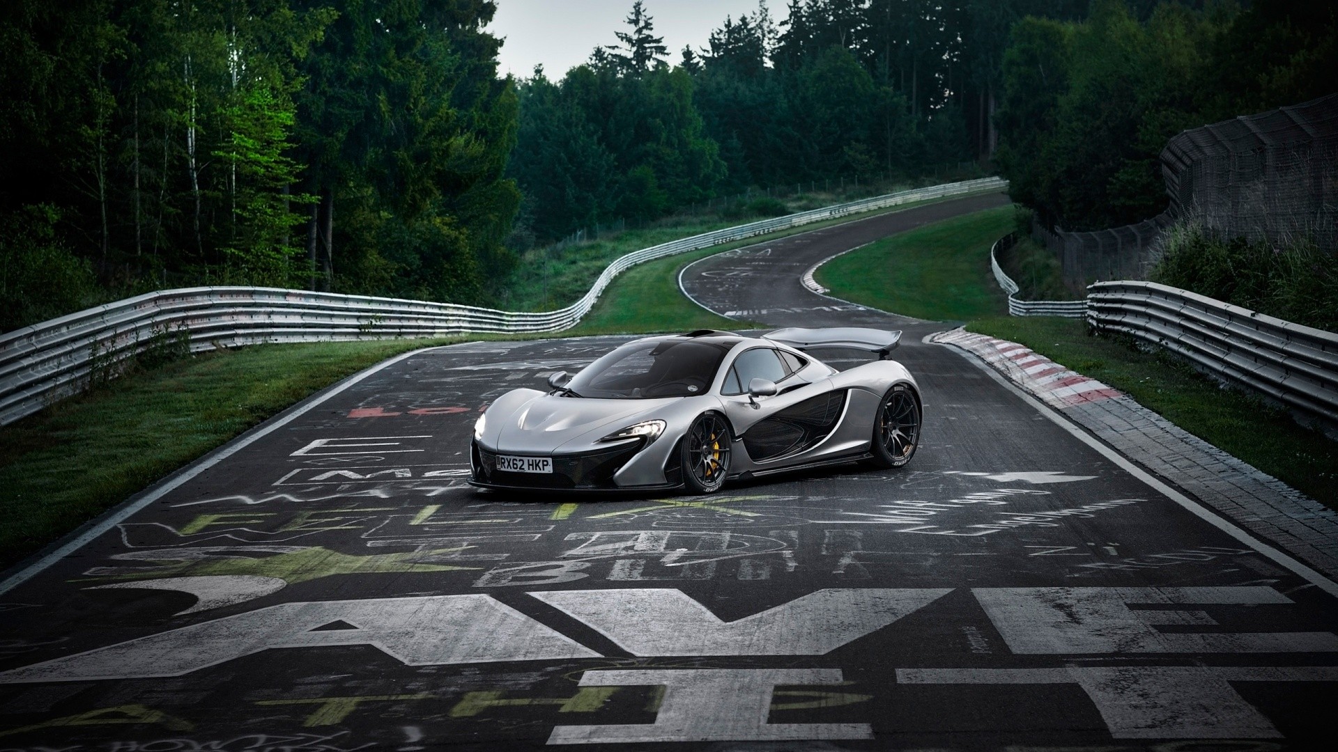 Silver McLaren P1 on Nurburgring race track HD Wallpaper