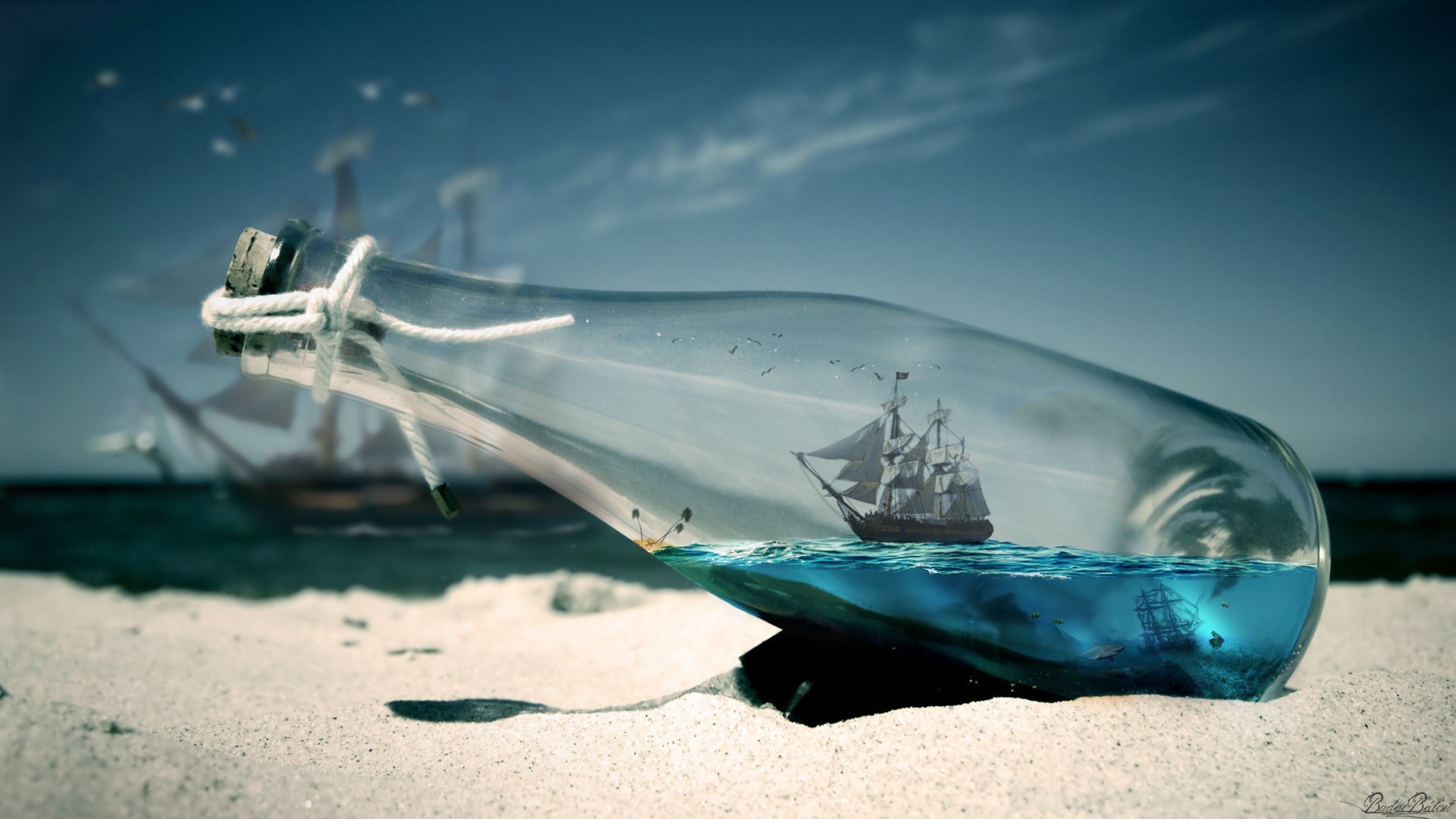 Sailing ship in a bottle on a sandy beach HD Wallpaper
