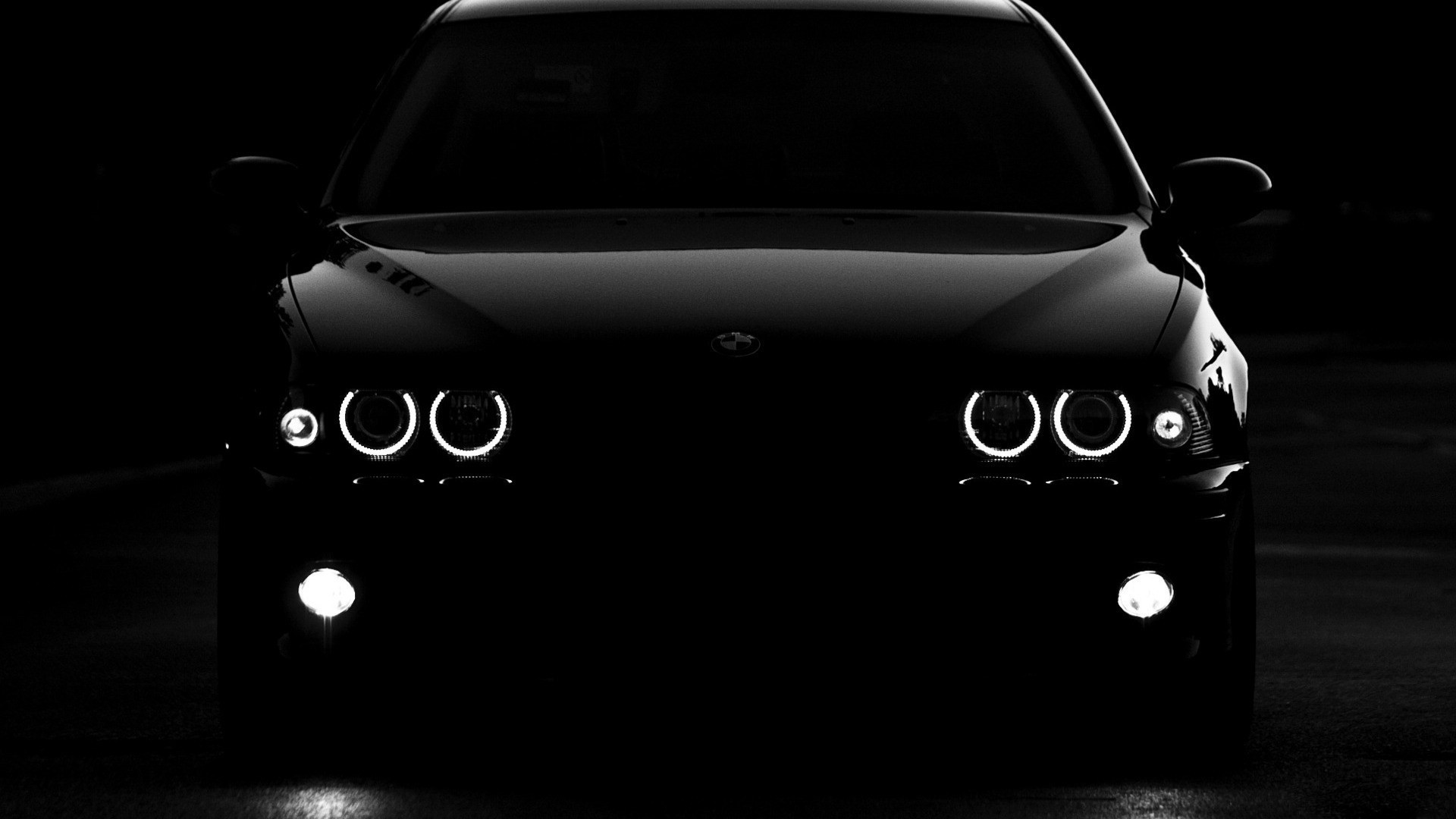 Black BMW E39 car with angel eyes headlights HD Wallpaper