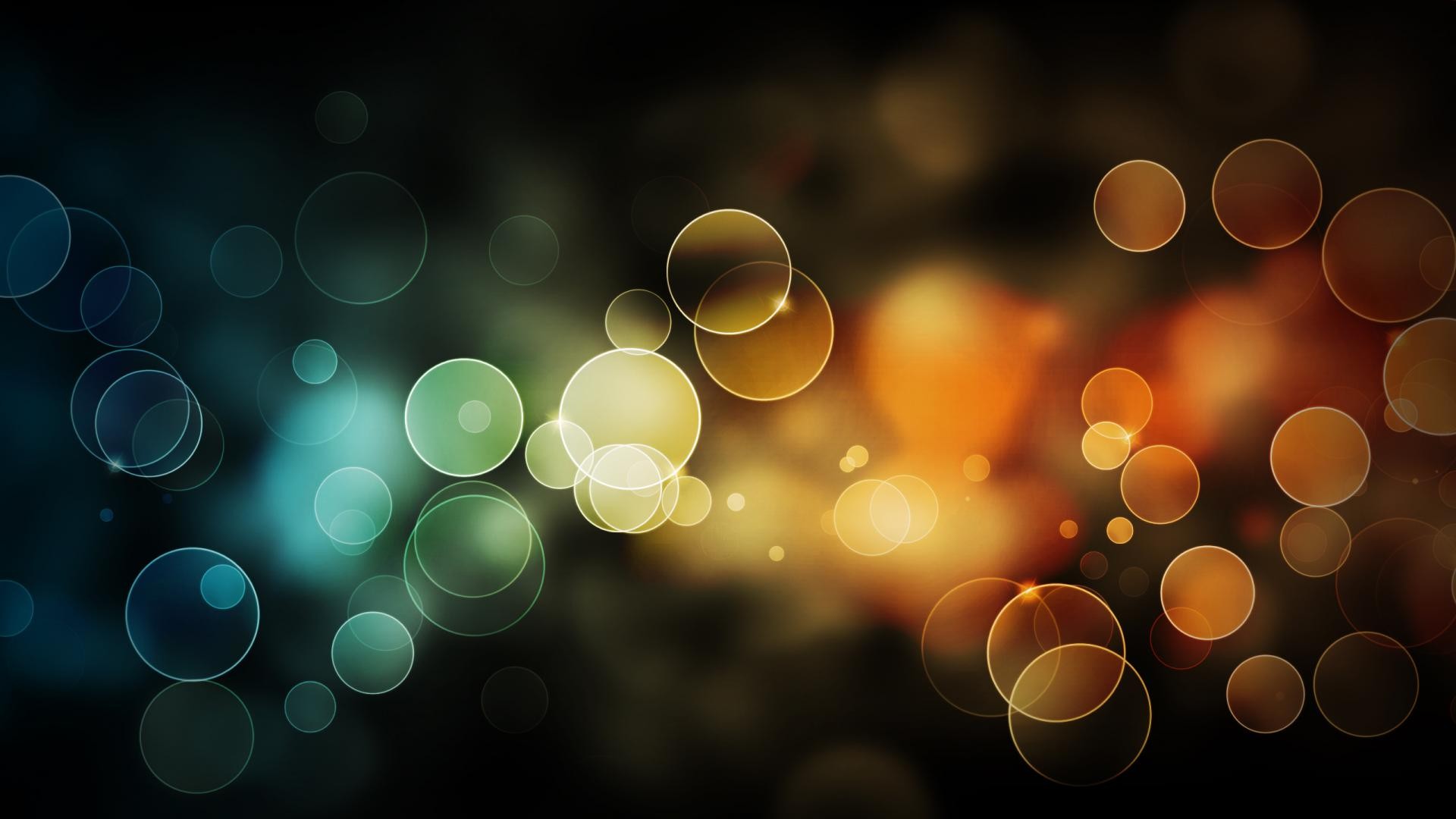 Abstract bokeh bubbles in blue, green, yellow, and orange HD Wallpaper
