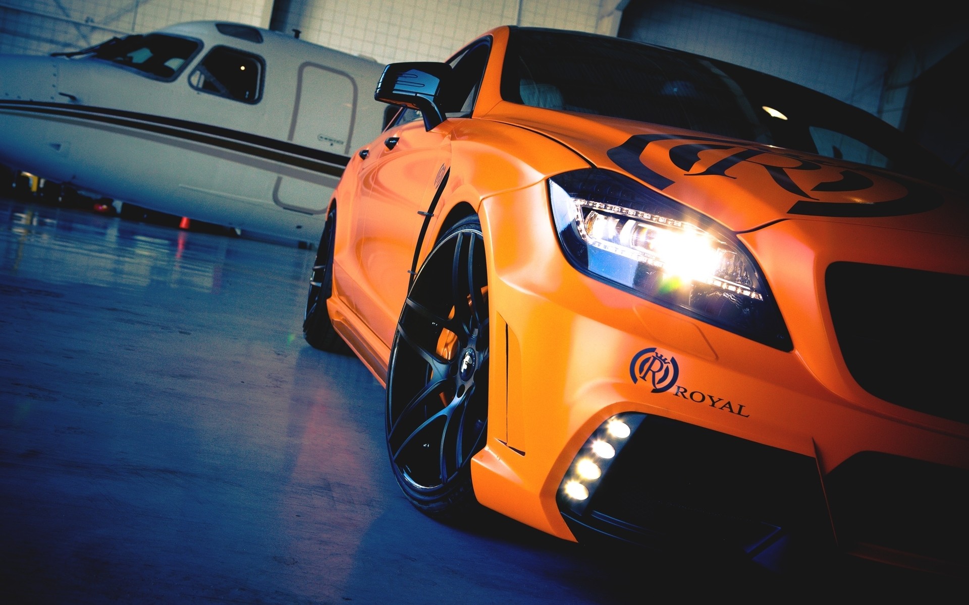 Orange Mercedes-Benz CLS with Private Jet HD Wallpaper