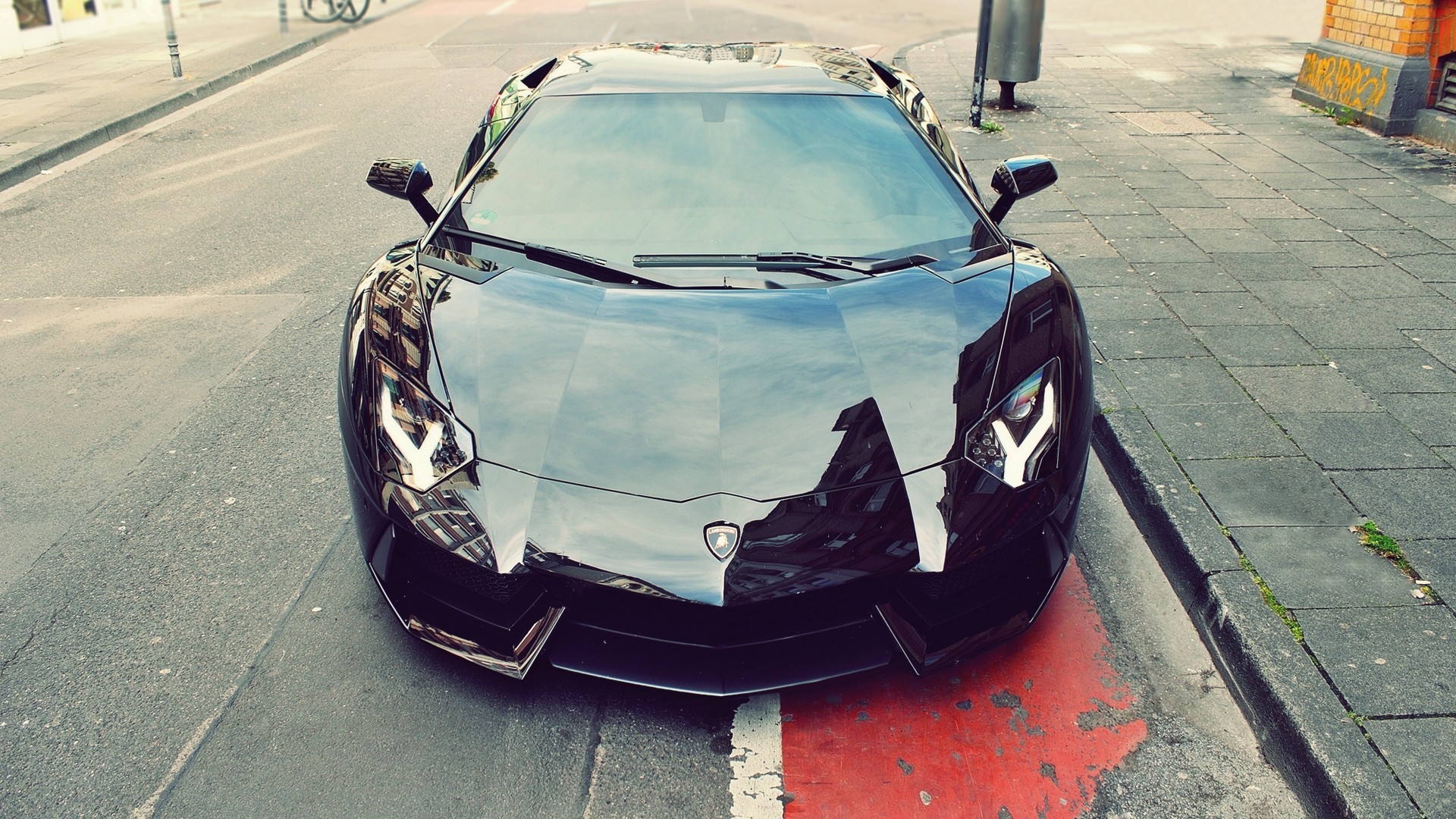 Black Lamborghini Aventador parked on a street HD Wallpaper