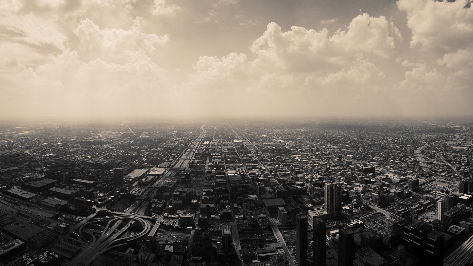 Aerial view of Chicago cityscape with clouds HD Wallpaper