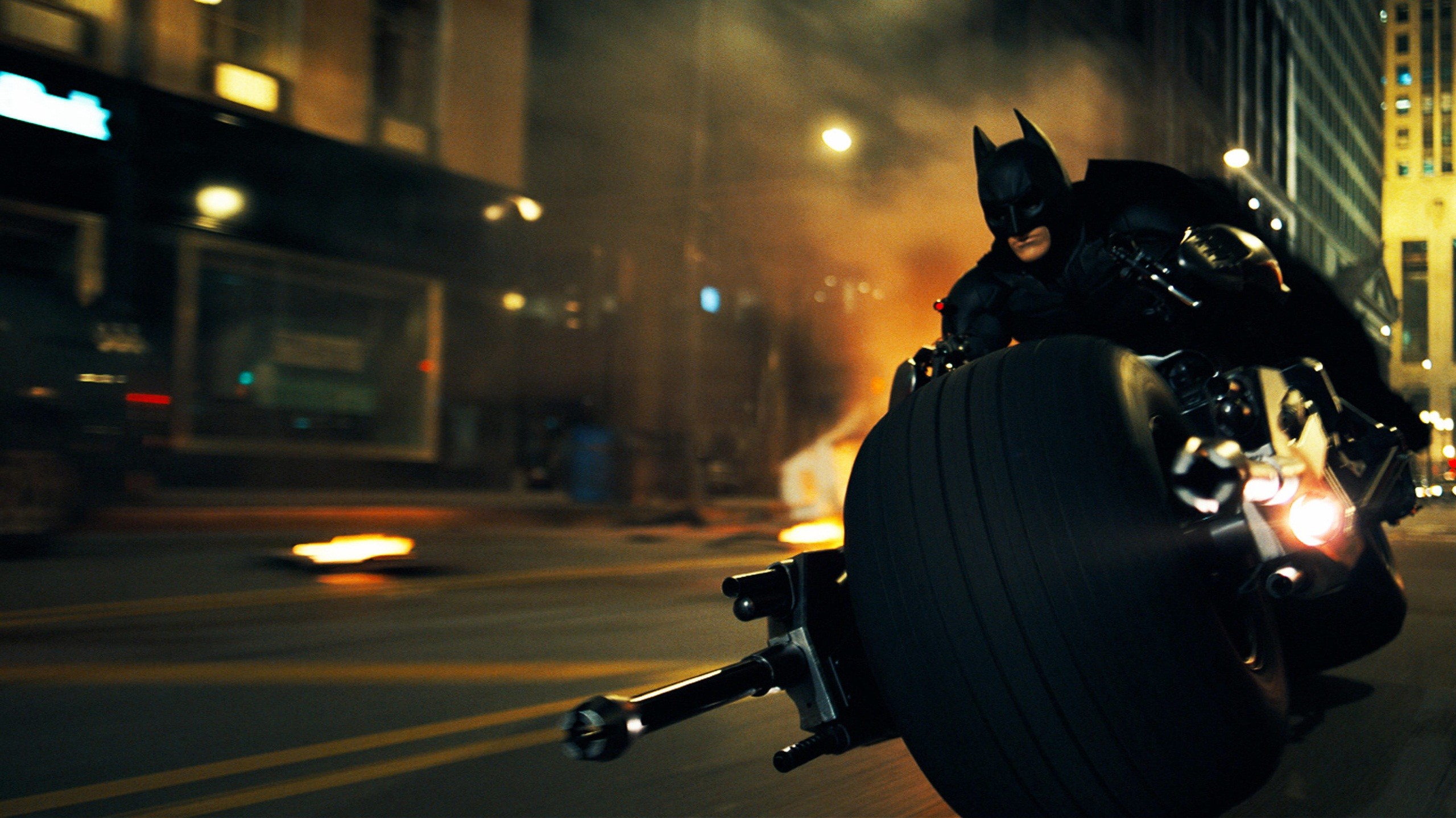 Batman riding the Batpod in The Dark Knight HD Wallpaper