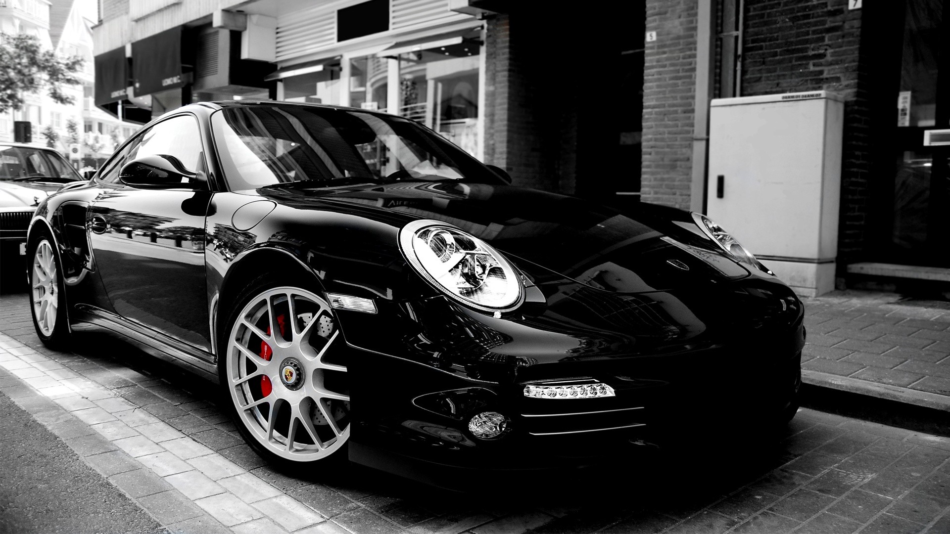 Black Porsche GT3 parked on a street HD Wallpaper