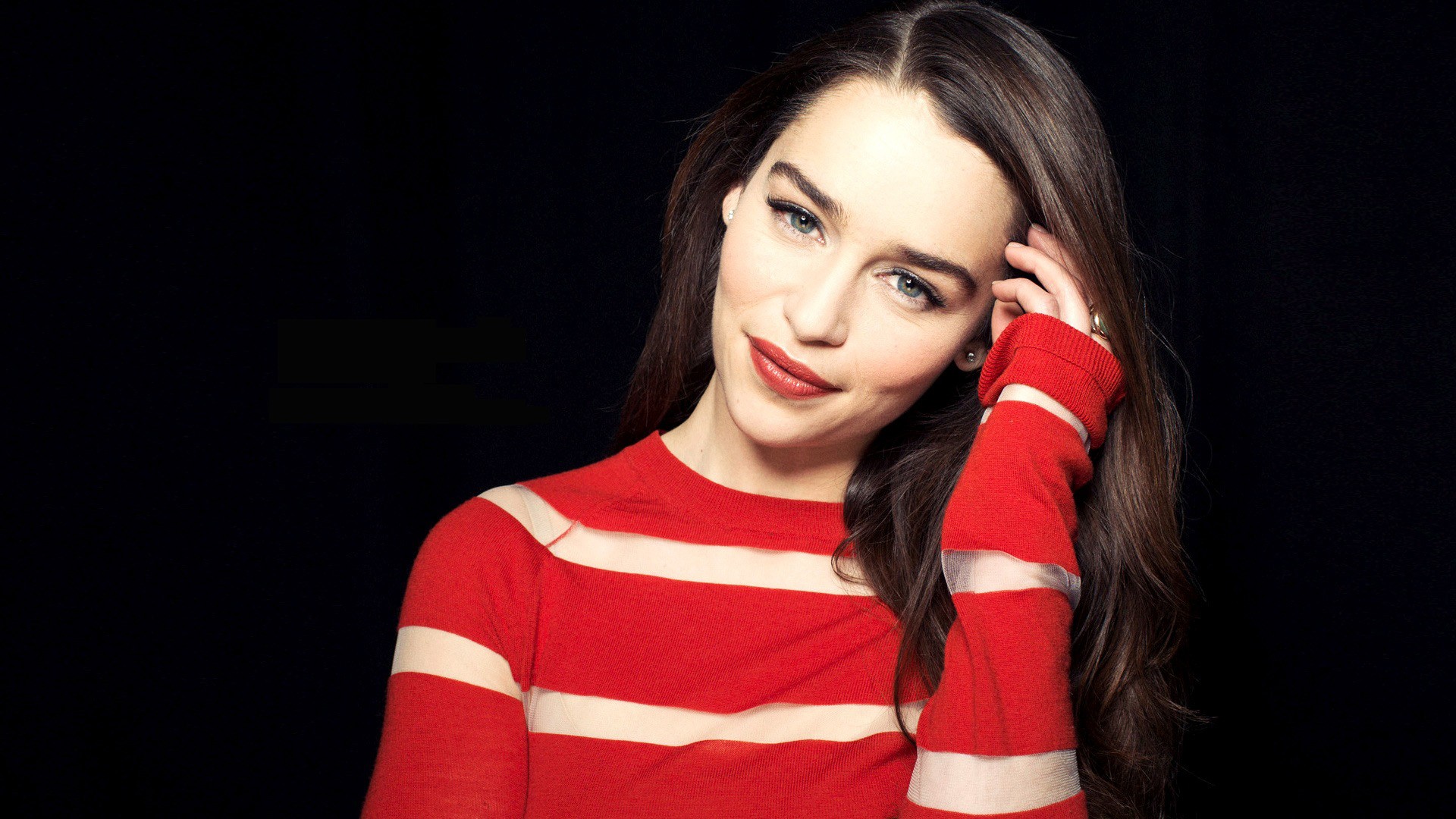 Emilia Clarke in a red and white striped sweater HD Wallpaper