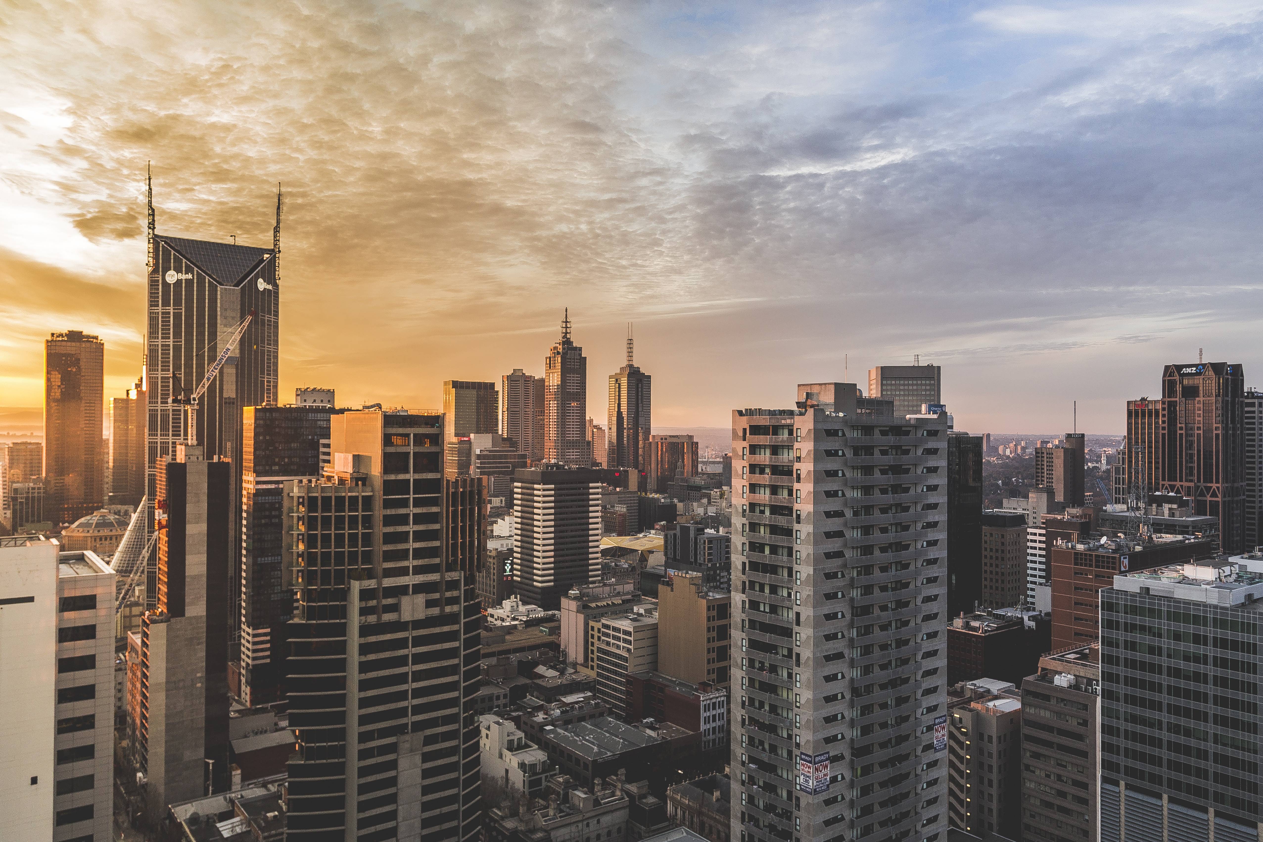 Cityscape at Dawn with Tall Buildings HD Wallpaper