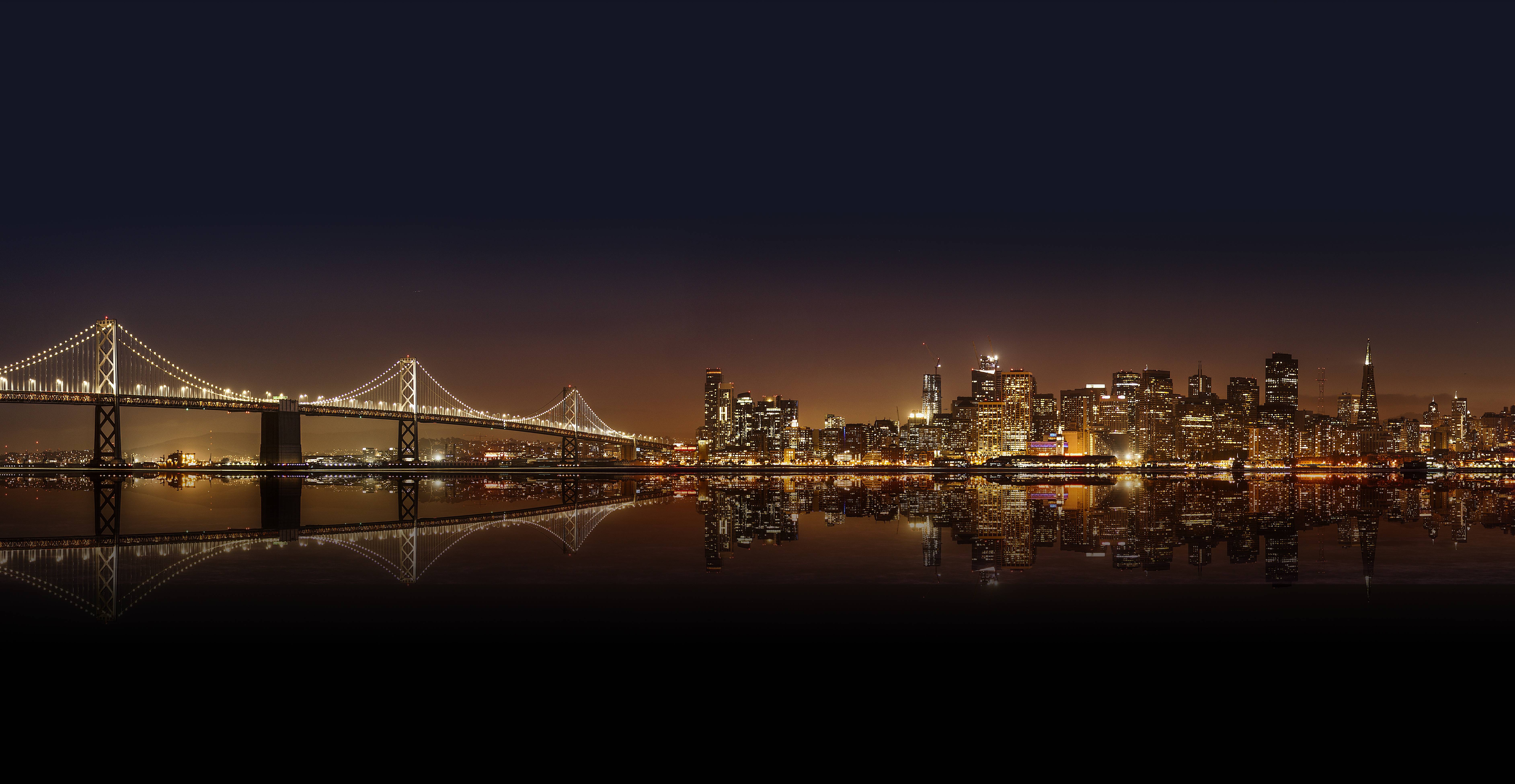 San Francisco Bay Bridge and skyline at night HD Wallpaper