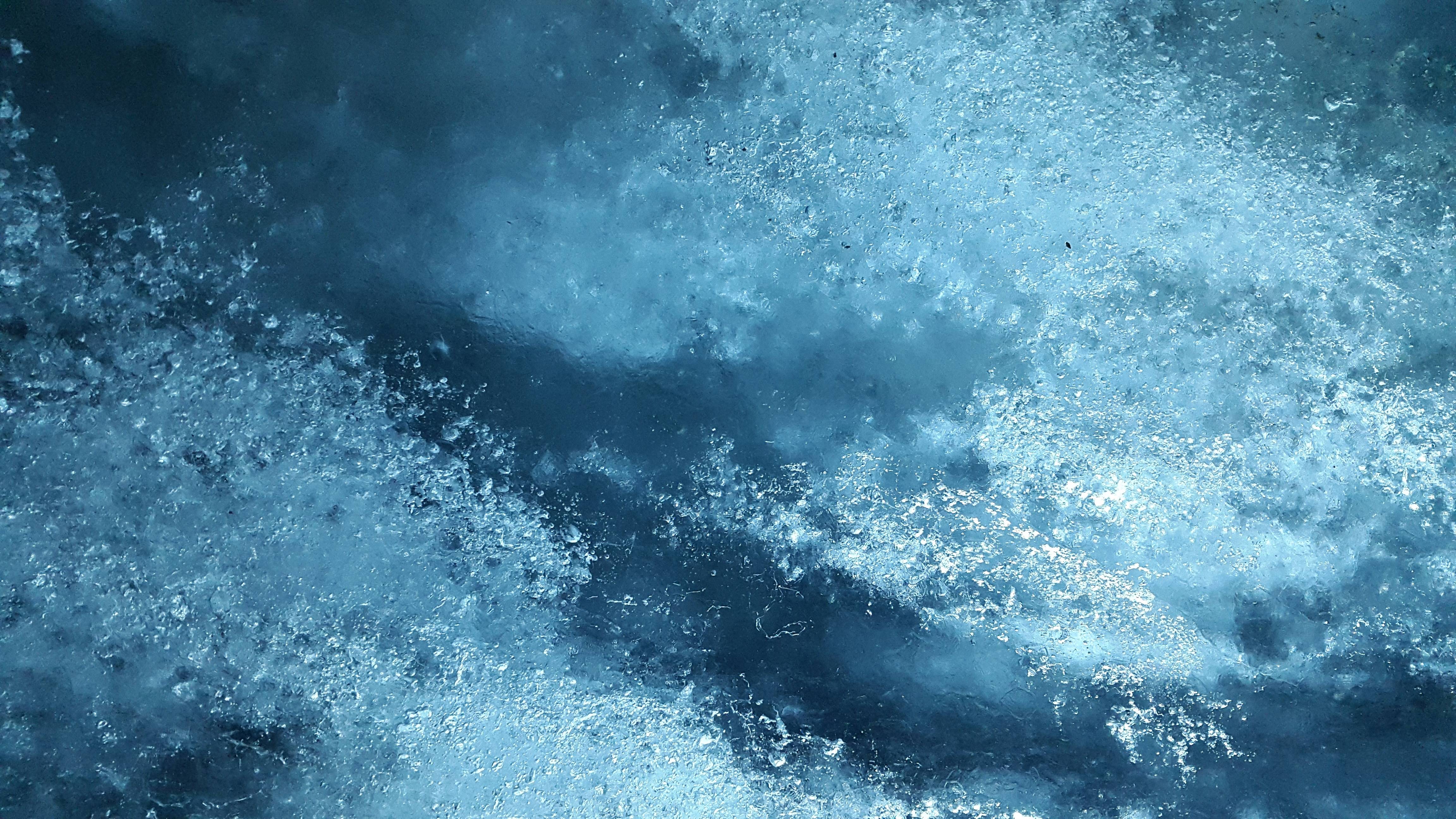 Close-up of ice with air inclusions in a glacier HD Wallpaper