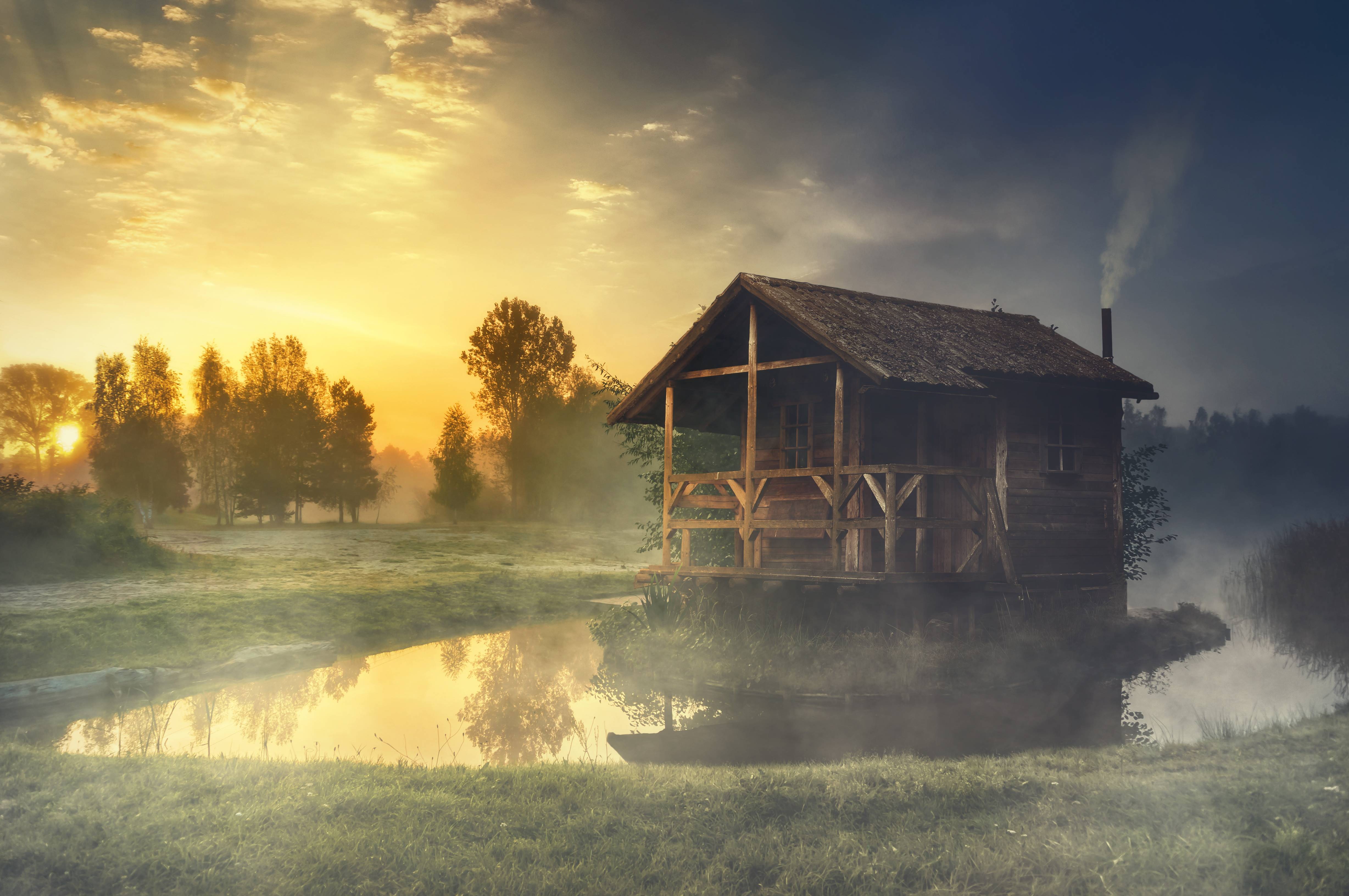Wooden hut on a lake at sunrise with mist HD Wallpaper